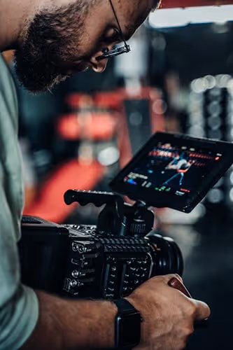 someone filming in a gym