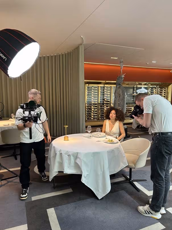 people filming in a restaurant