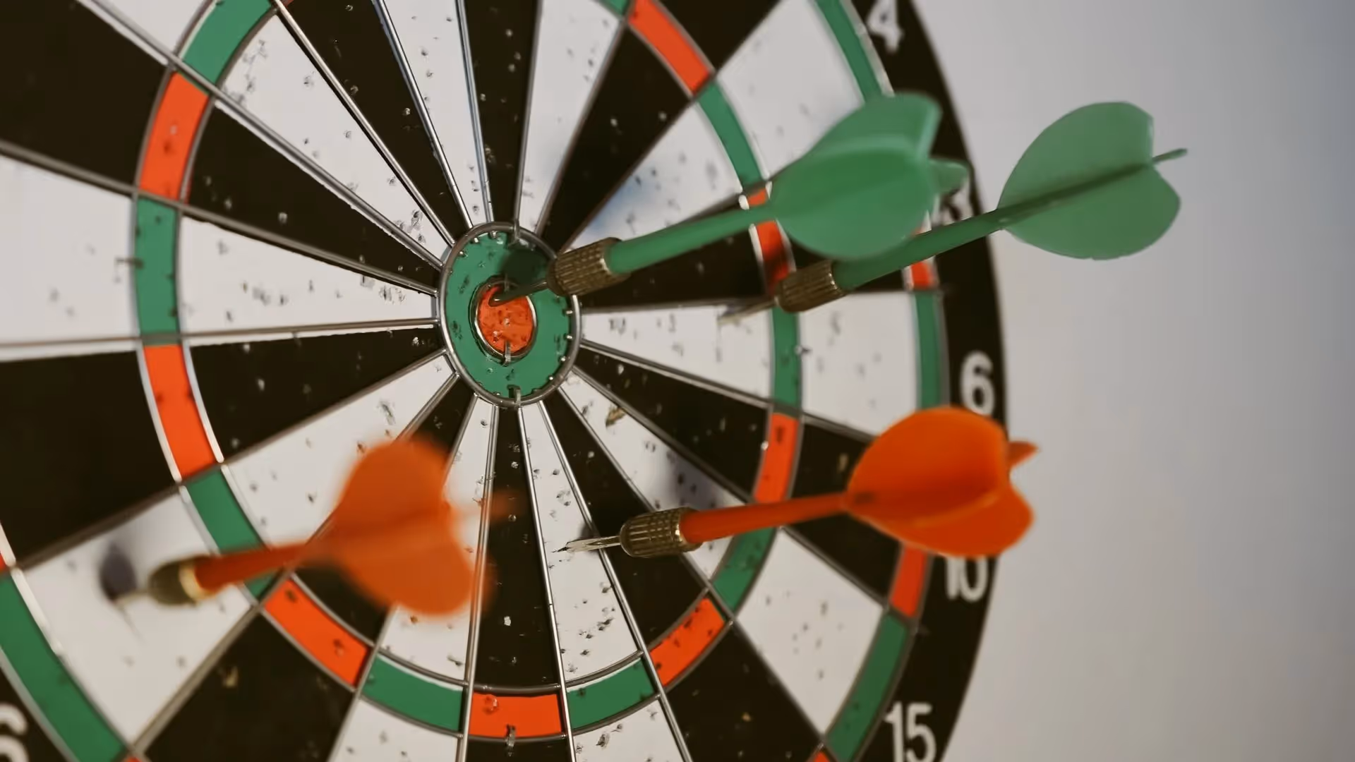 Darts board with darts spears