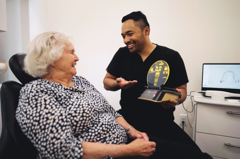 Implant-supported dentures patient consultation at Princeton Dental Studio in Princeton, TX