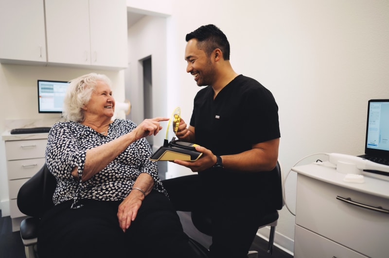 Denture patient smiling at Princeton Dental Studio in Princeton, TX