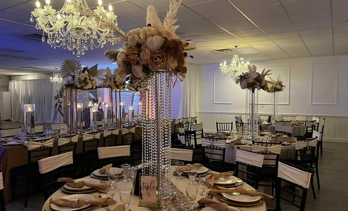 Elegant floral centerpieces for event at The PAlmyra Venue 