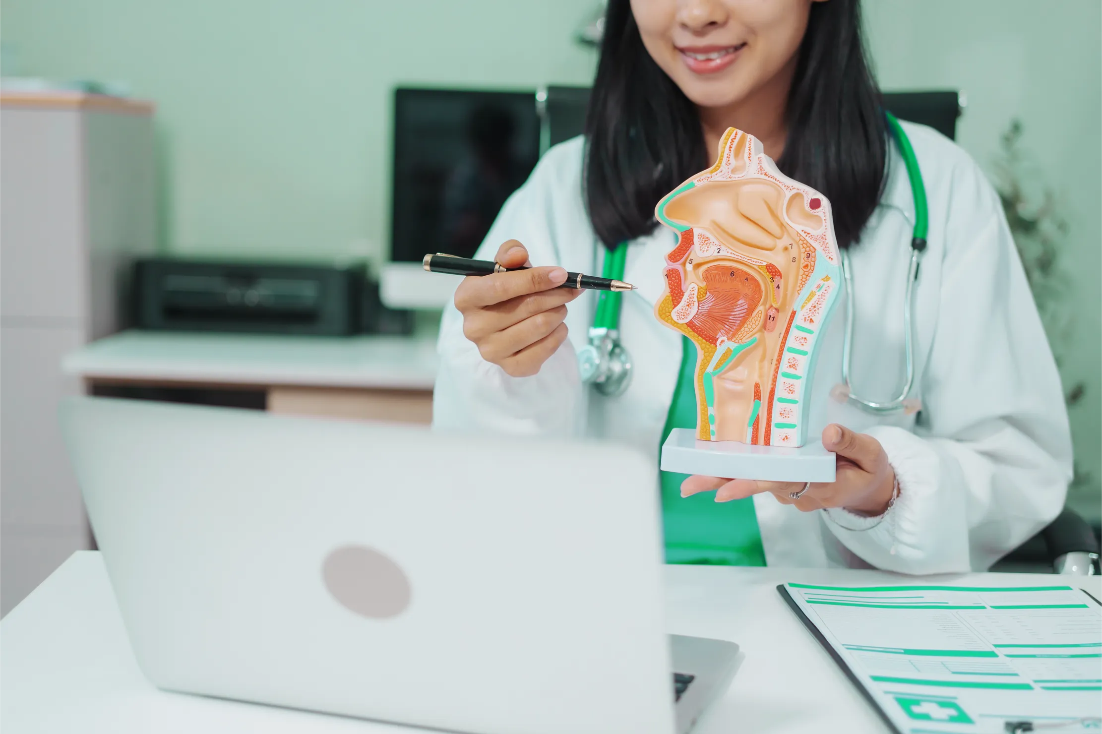 Gastroenterologist showing the digestive system on a canvas