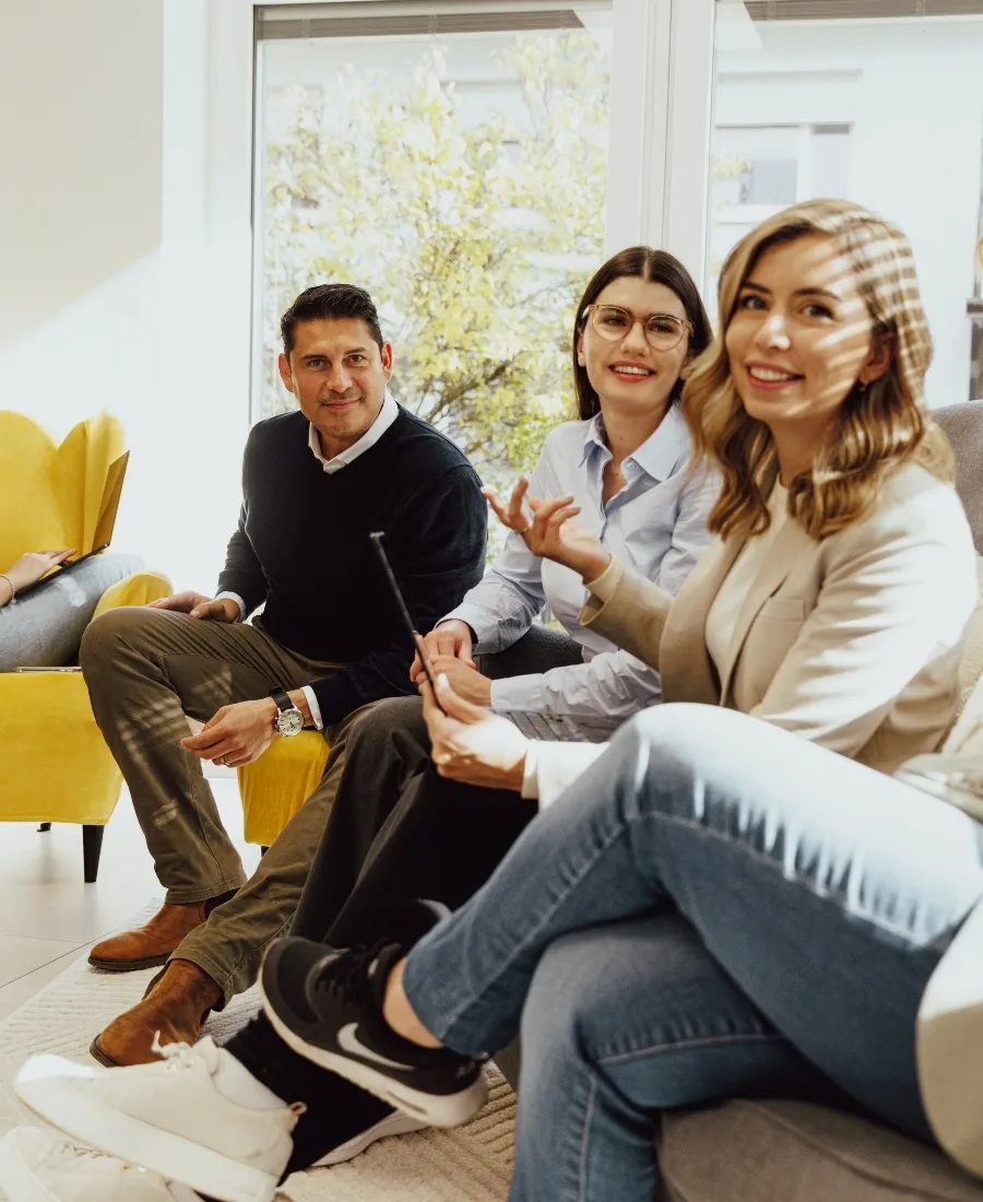 foxdot employeesd sitting on a couch. 