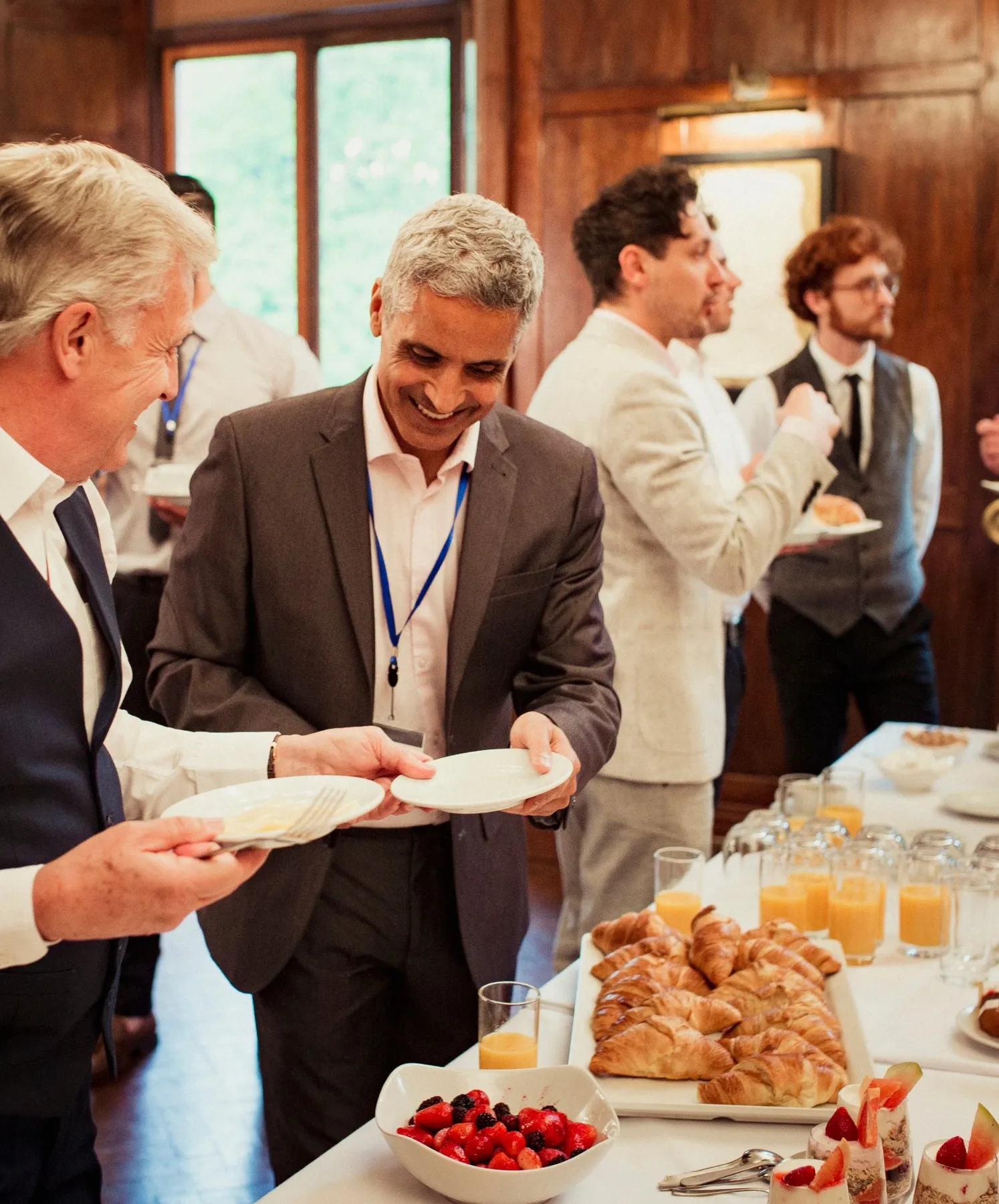 Corporate event at North Mymms Park, featuring happy guests enjoying food, drinks, and a lively atmosphere.