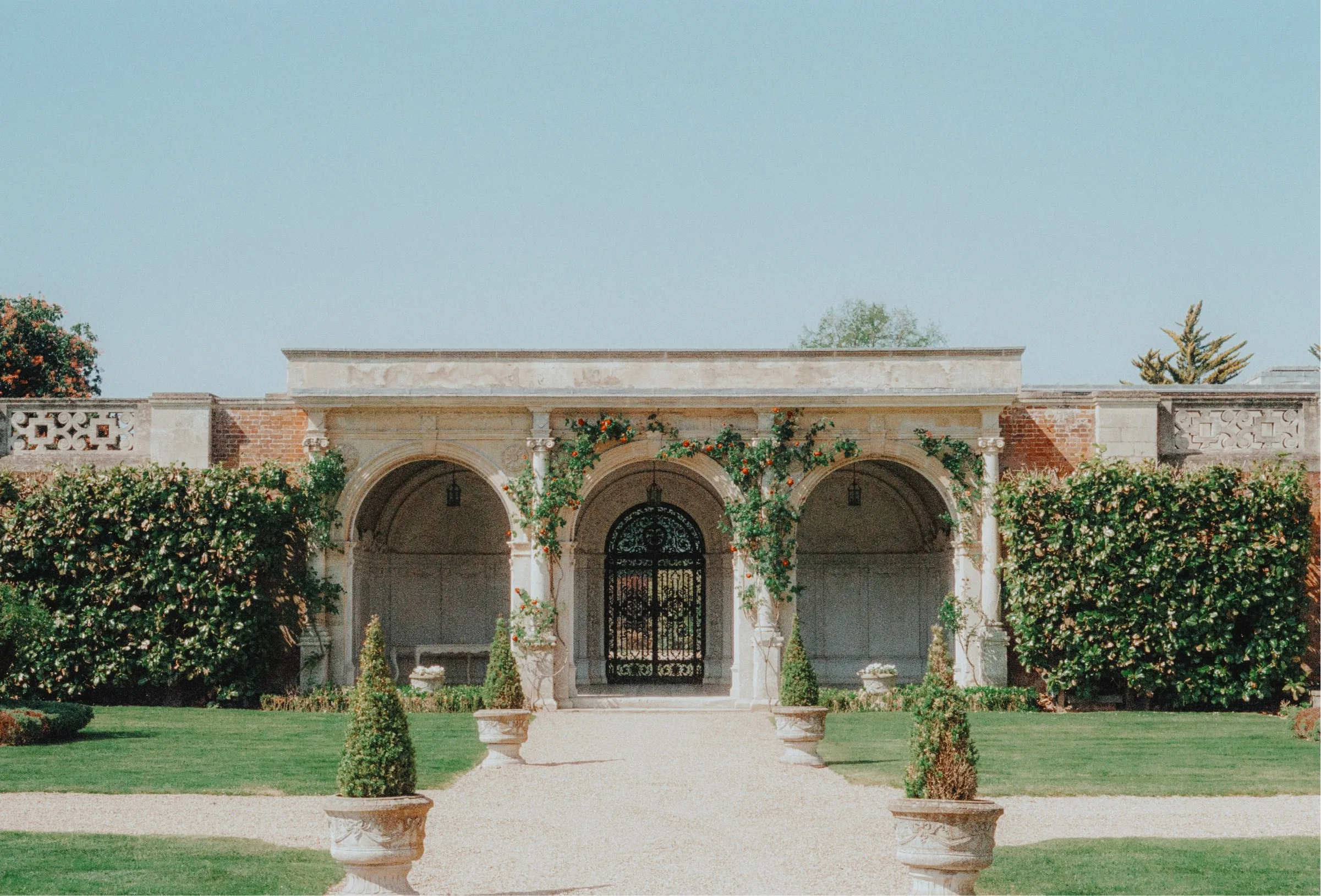 The Loggia in North Mymms Park - A stunning three-arch marble structure with mosaics, set in beautiful gardens, ideal for weddings, events, and filming