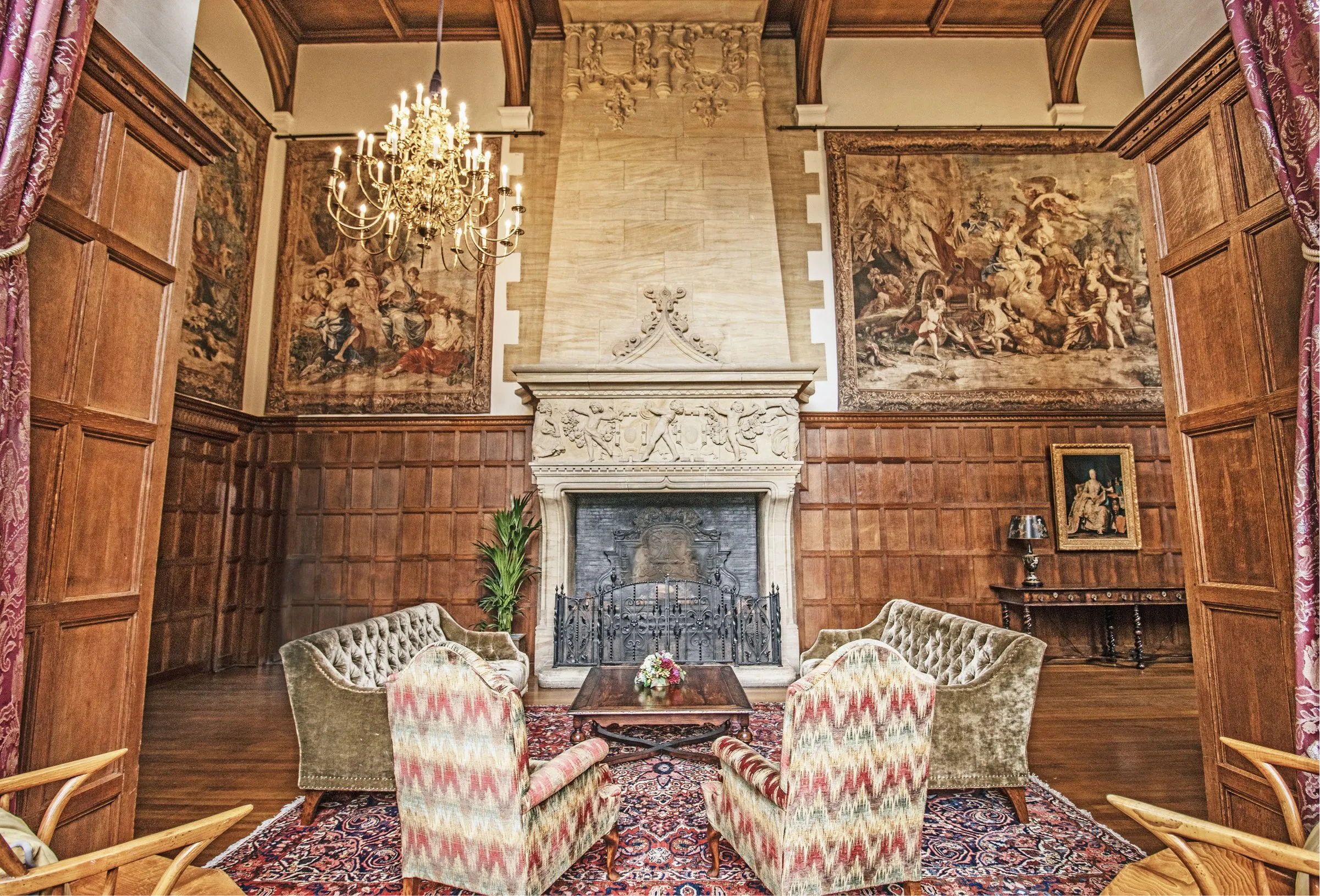 Magnificent Elizabethan architecture with classic furniture, historic big fireplace, and stunning tapestries
