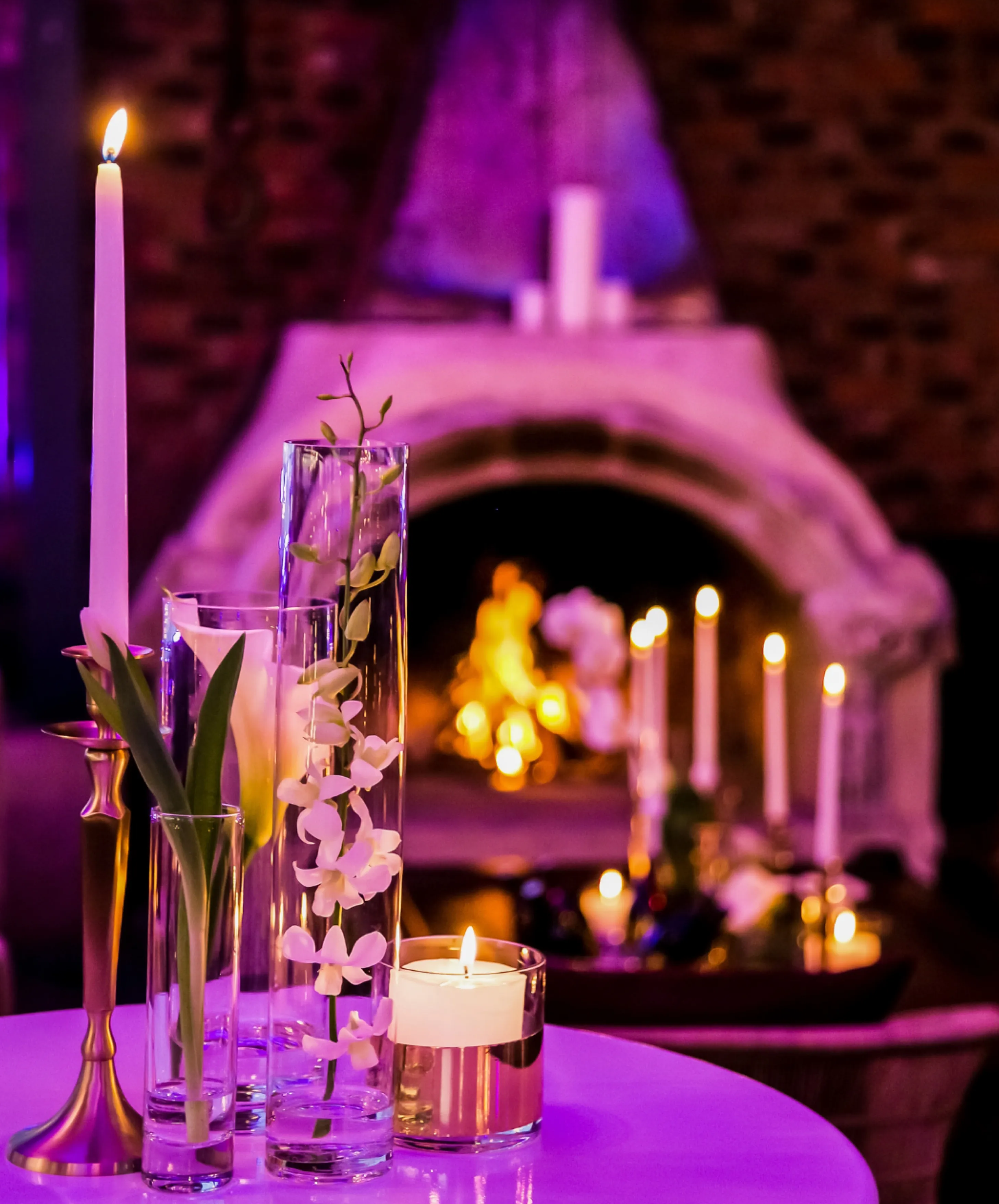 Embraced by a romantic atmosphere, a lovely event unfolds at North Mymms Park, adorned with candles and flowers, creating an enchanting and intimate ambiance