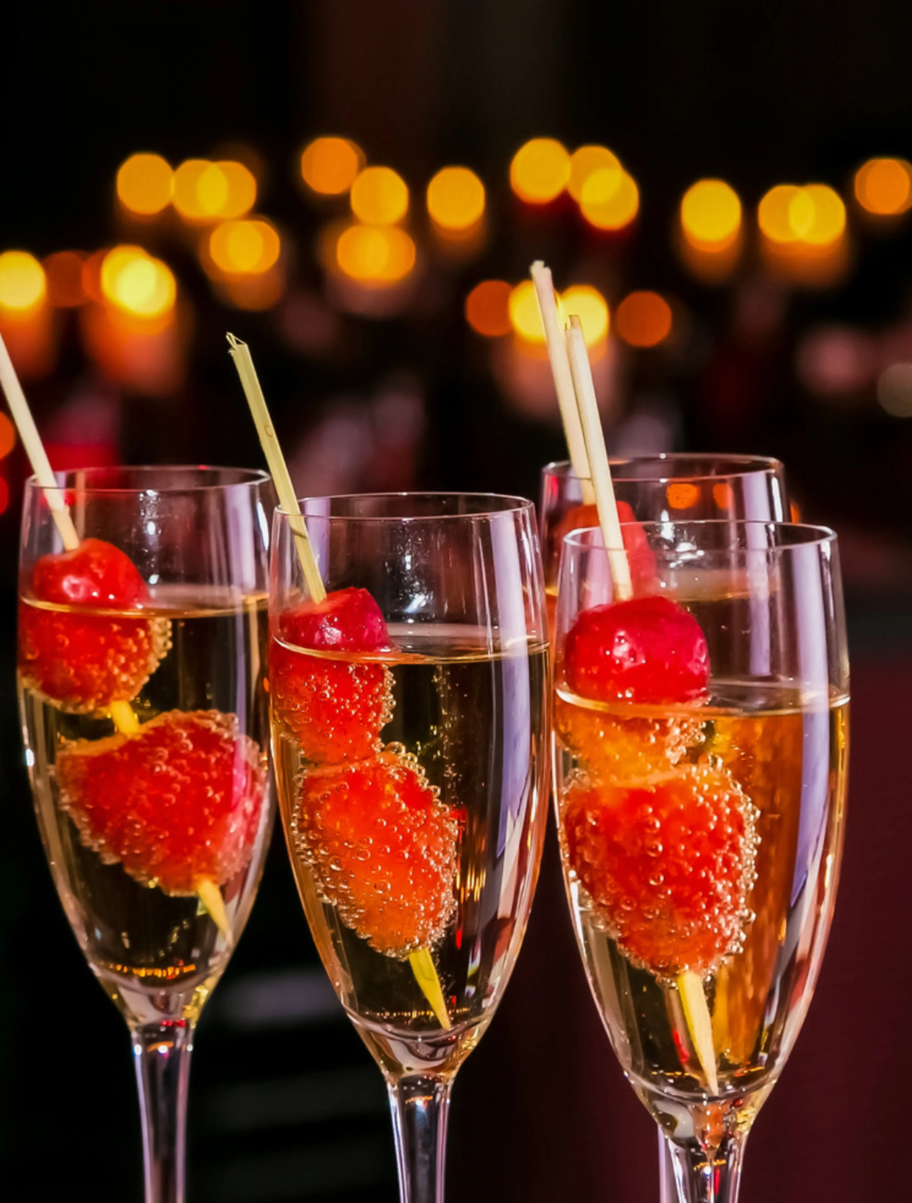 Indulge in fancy fizzy drinks adorned with fresh berries, a luxurious treat offered at the event held at North Mymms Park, elevating the experience with a touch of elegance.