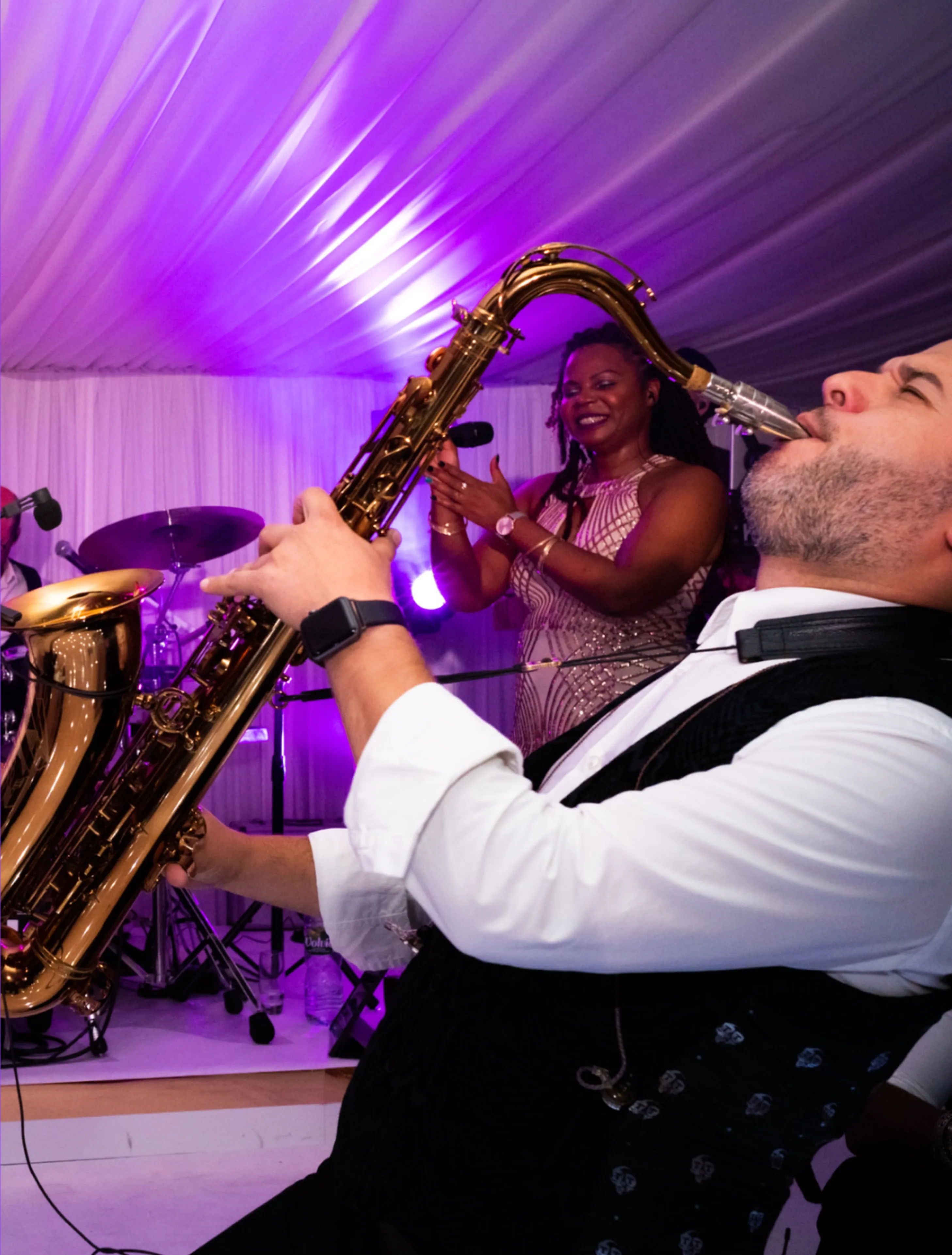 Immersed in the enchanting pavilion of North Mymms Park, a talented saxophonist captivates the audience with soulful melodies, adding a touch of musical magic to the ambiance