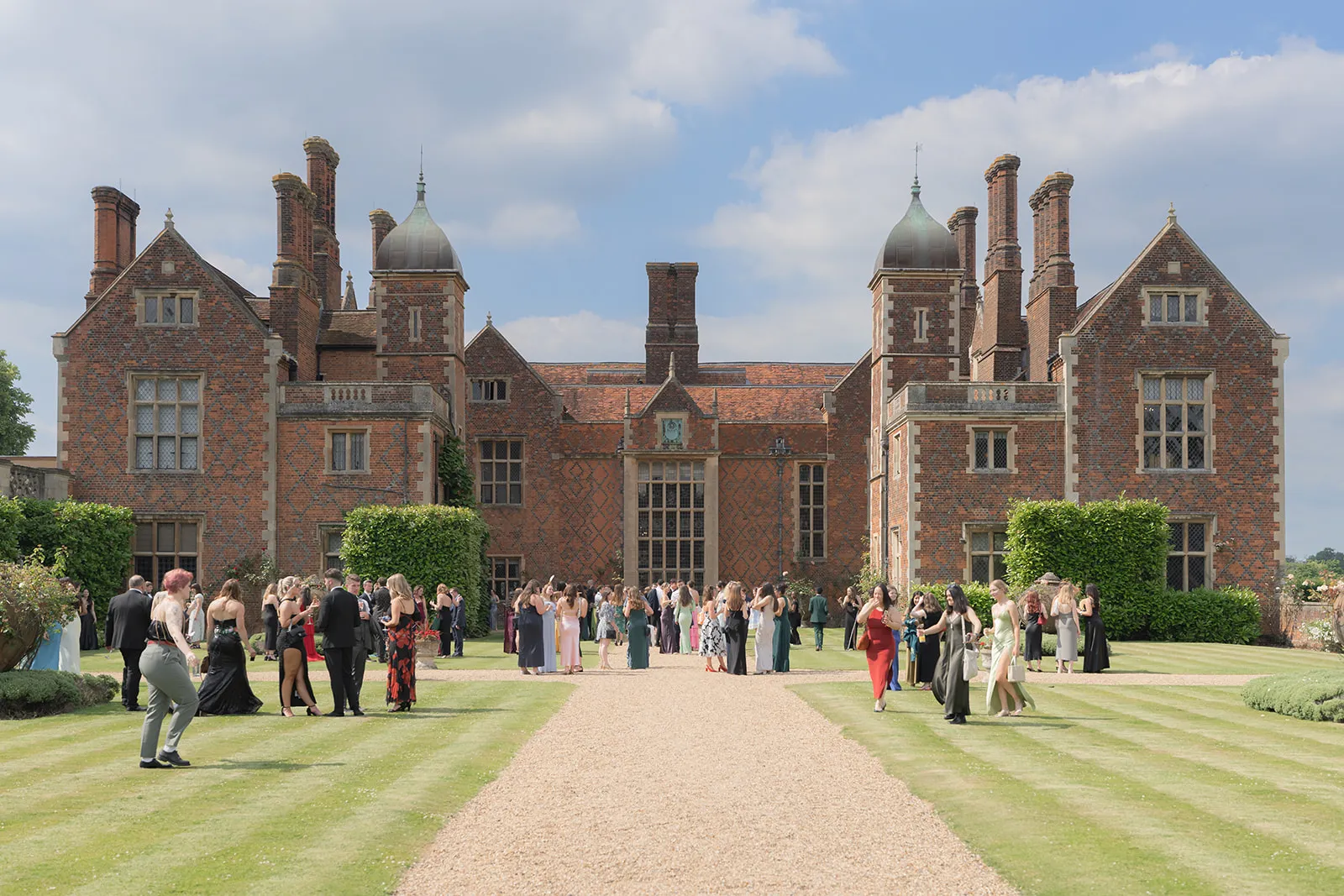 Three talented musician women play the saxophone, creating delightful melodies for a joyous event in the pavilion at North Mymms Park