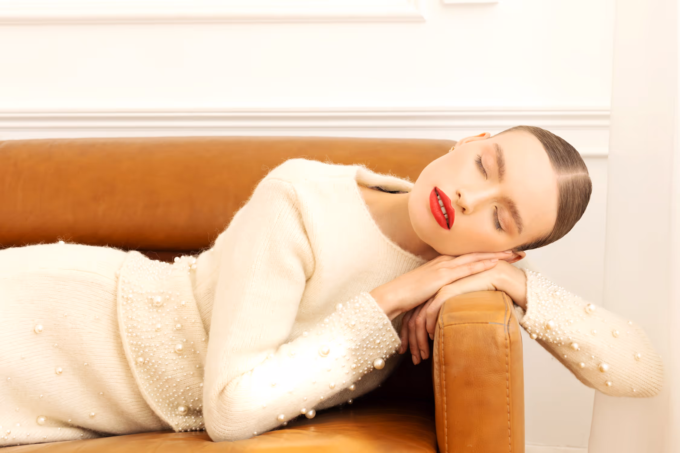 Woman lying on her side with closed eyes