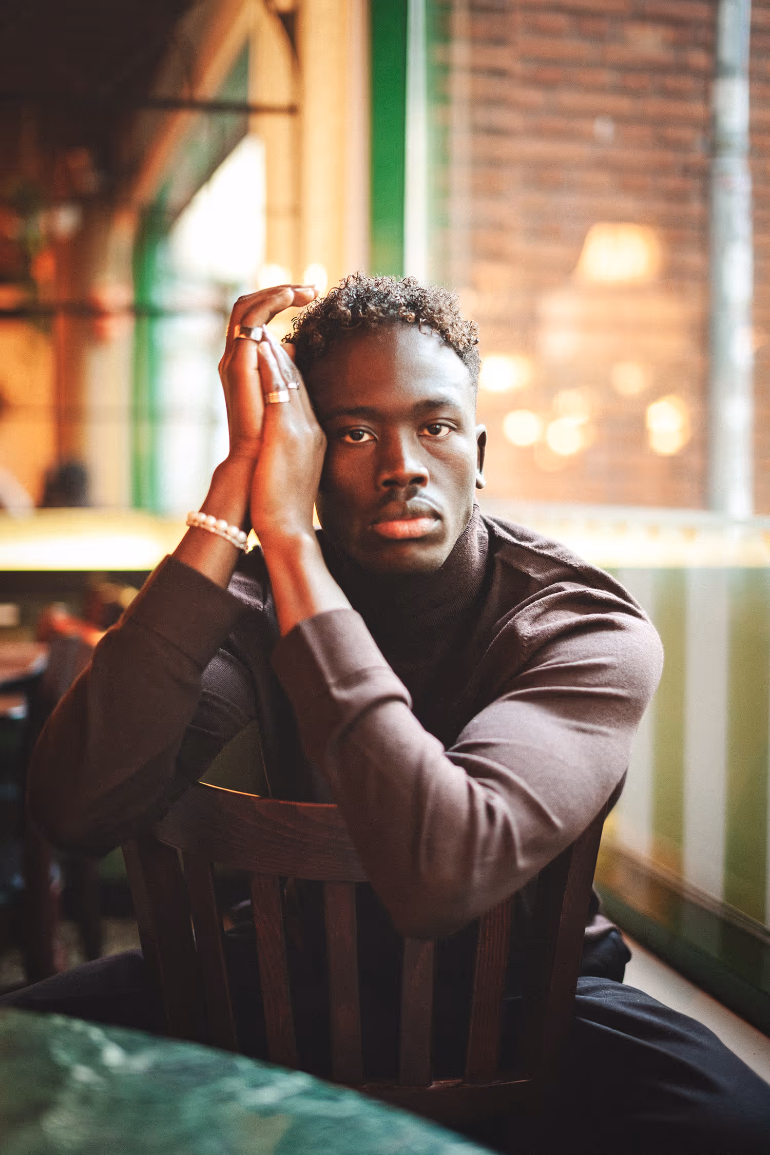 Man sitting on a chair in a café