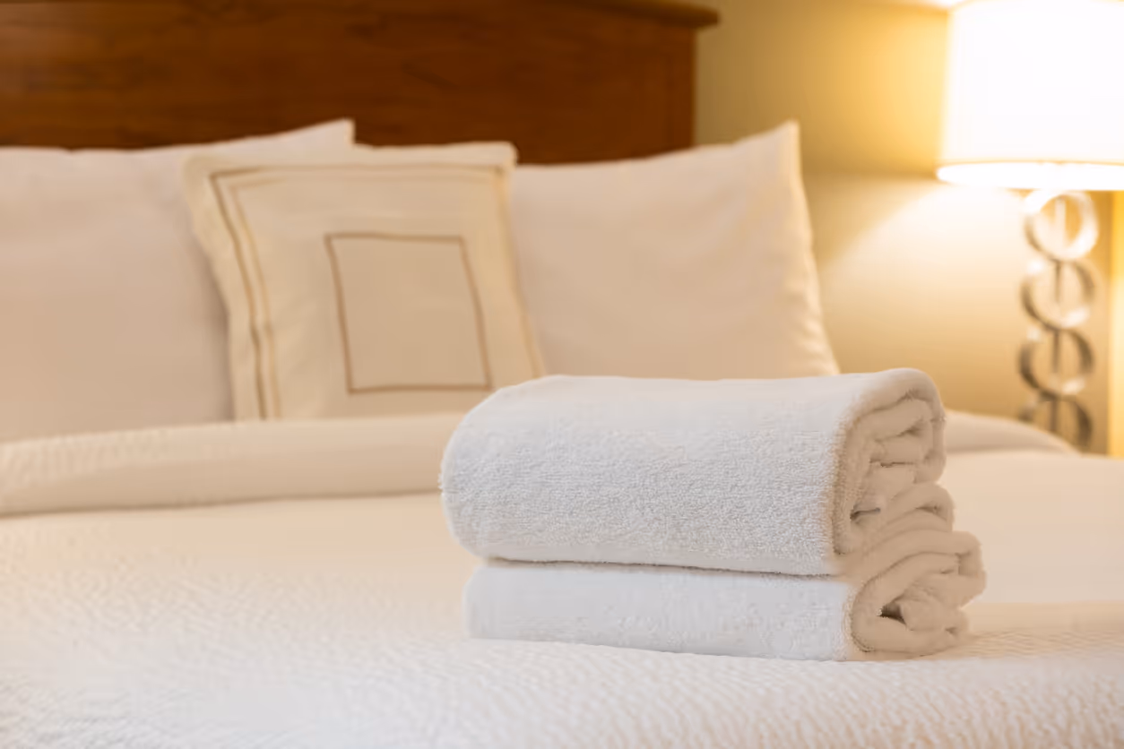 Towel arranged on bed