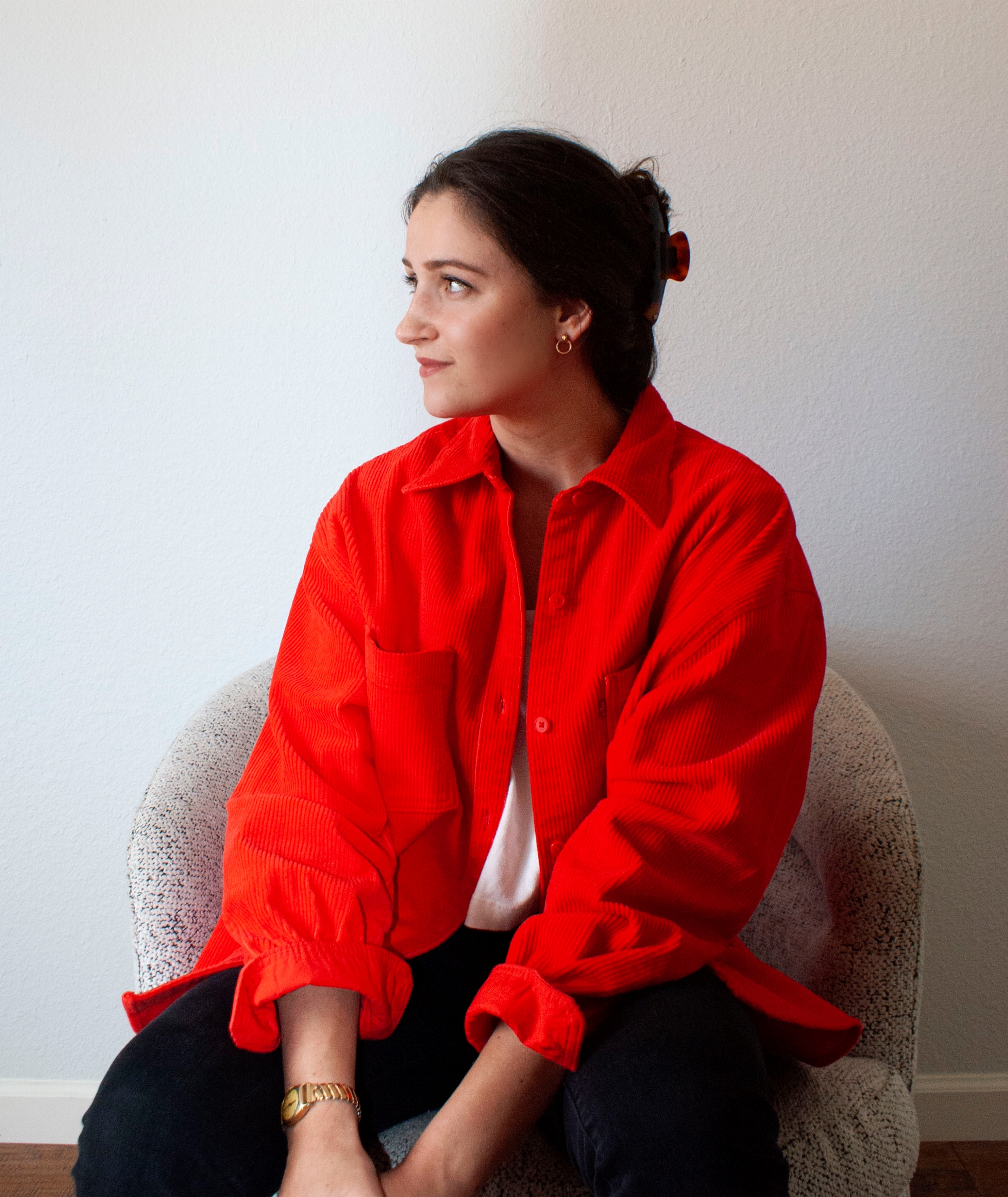 Portrait of Designer looking at main text