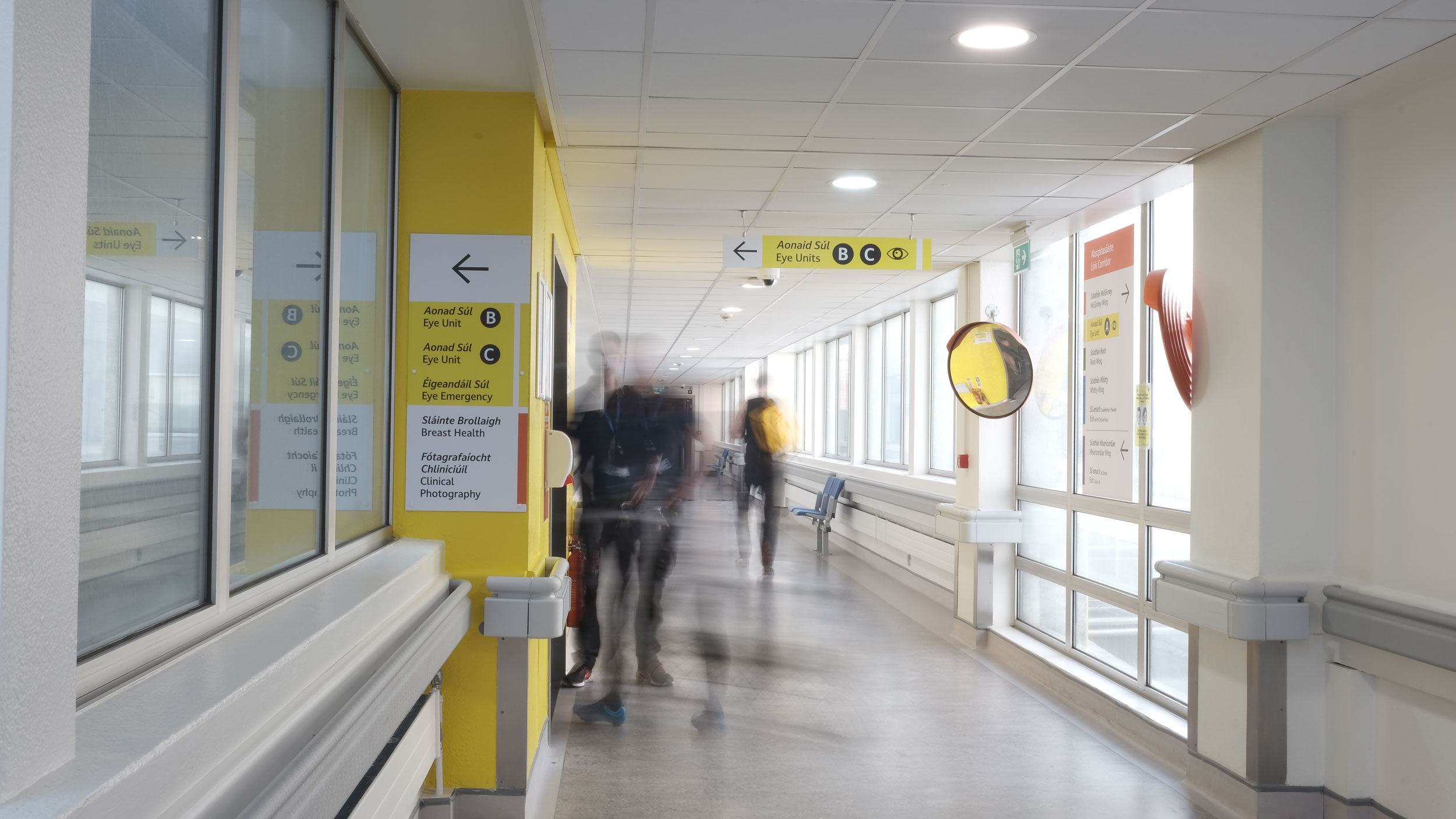 New signage and yellow painted landmarking on the link corridor for Eye Department.