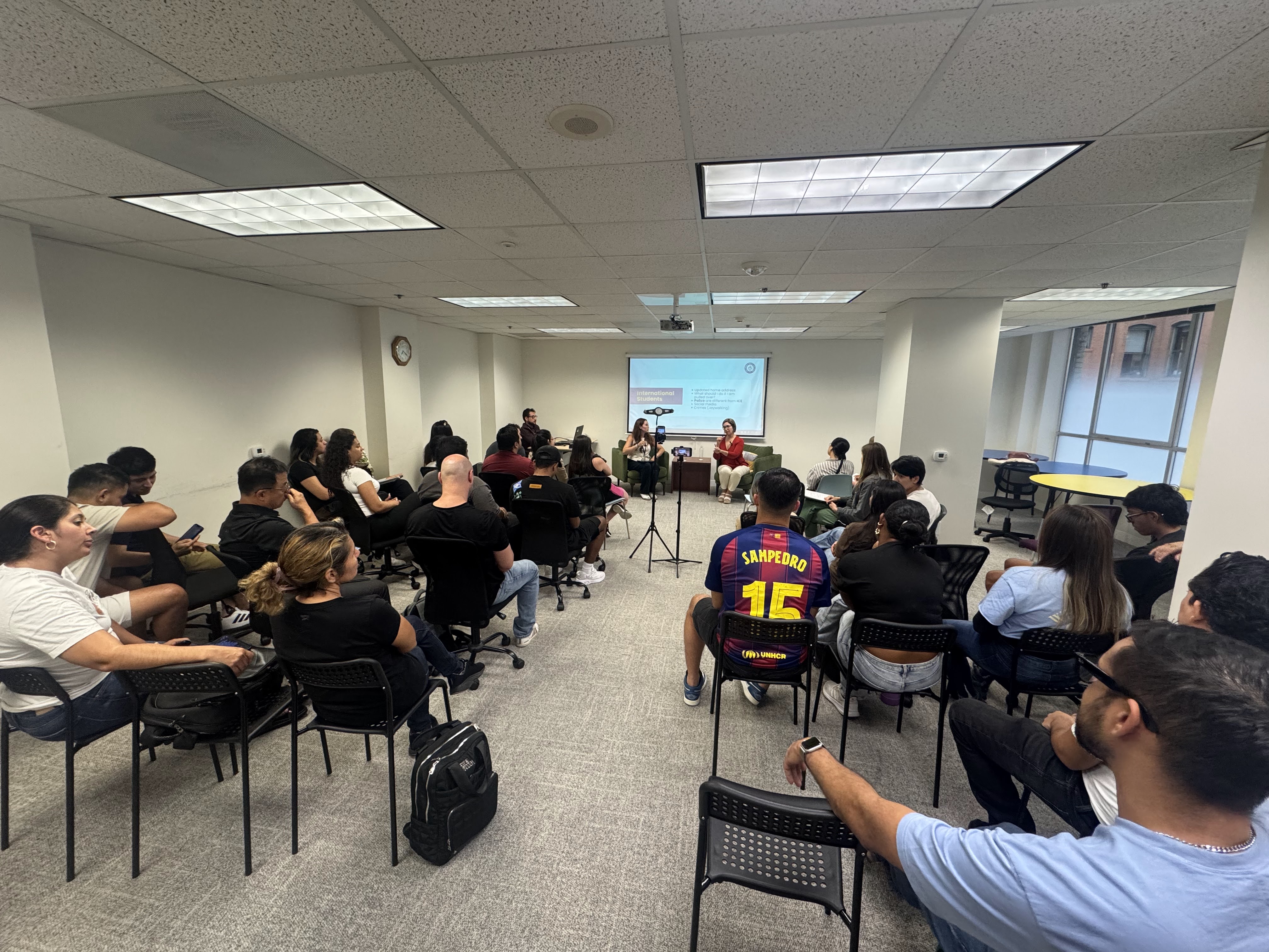 Packed new-student orientation presentation at Columbia West College, where international students learn how to learn English in an immersive Los Angeles environment