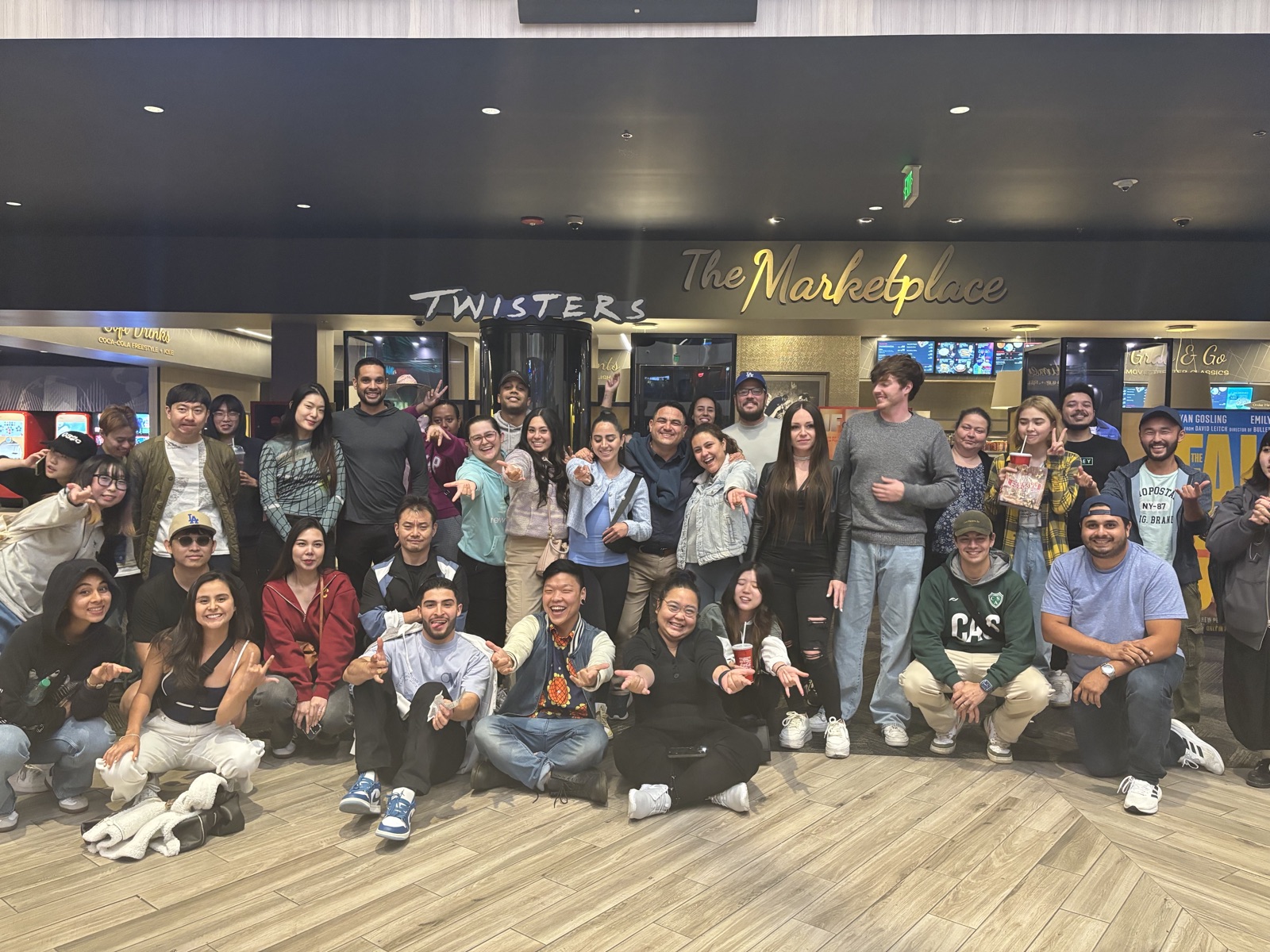 CWC students group photo at a bowling night — social outings like this give Columbia West College students real-world daily English conversation practice