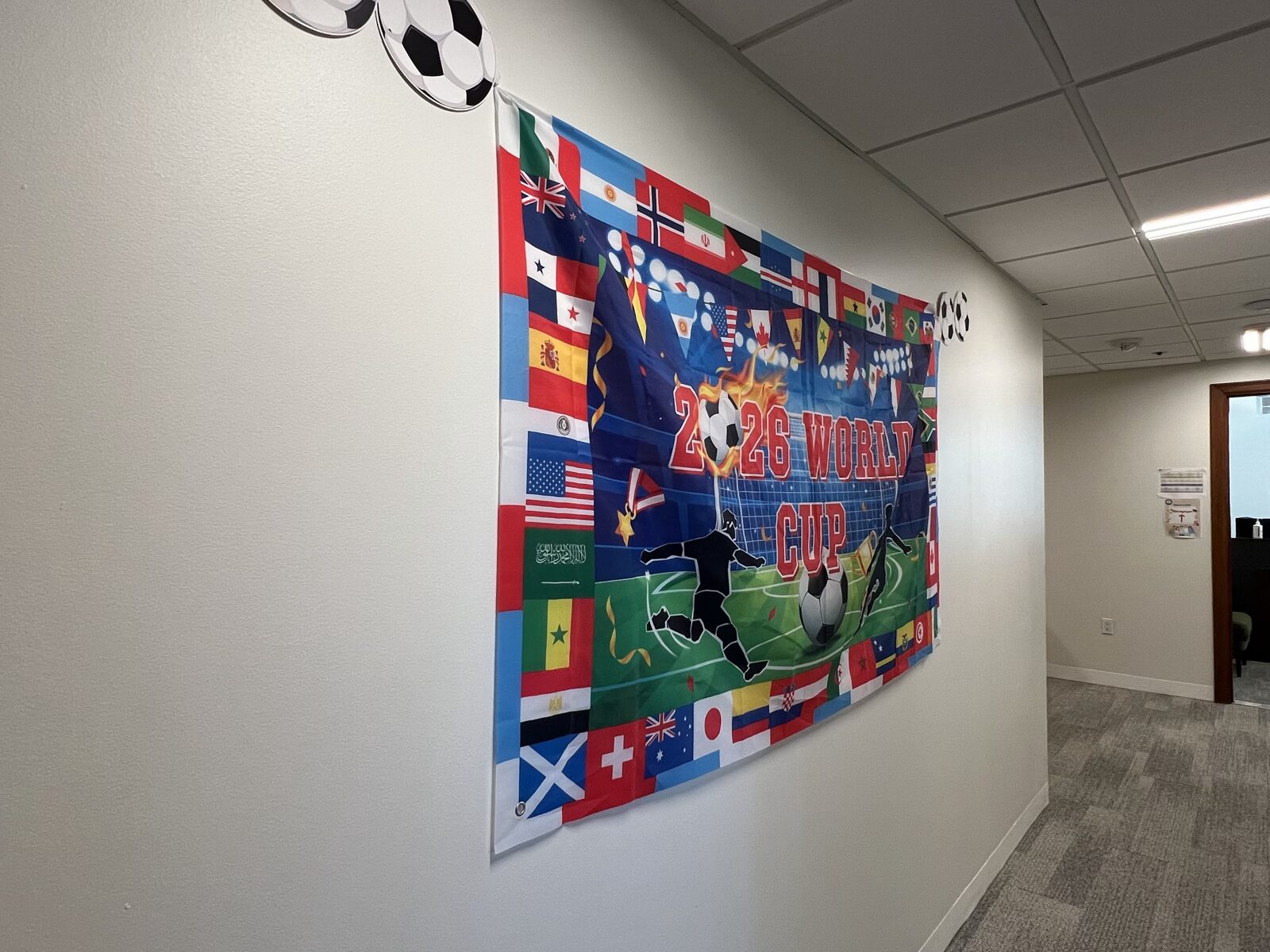 A World Cup banner in a CWC hallway showing how separate ideas can connect into one organized message