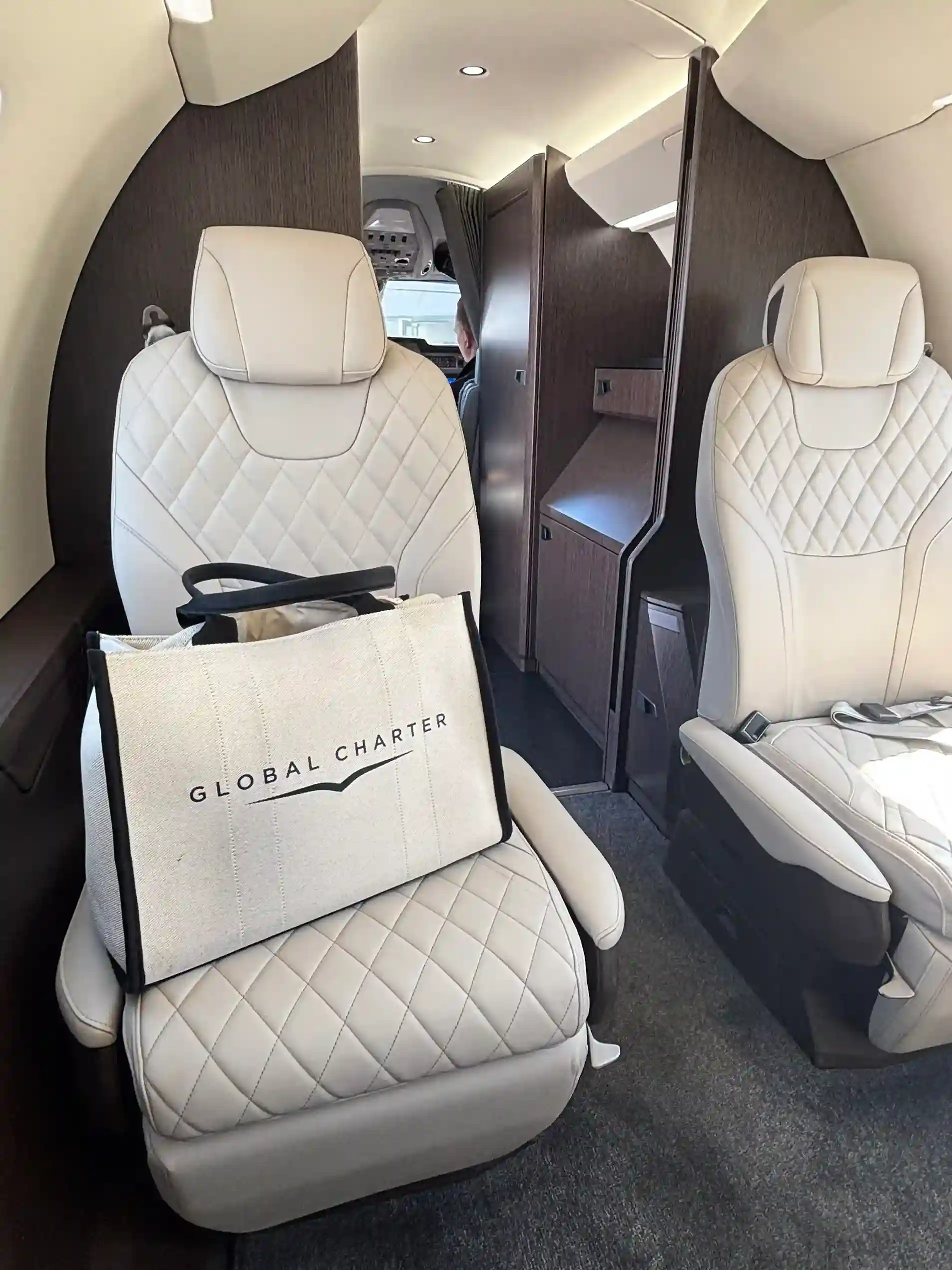 Client Engaged in Work and Charter Experience Onboard