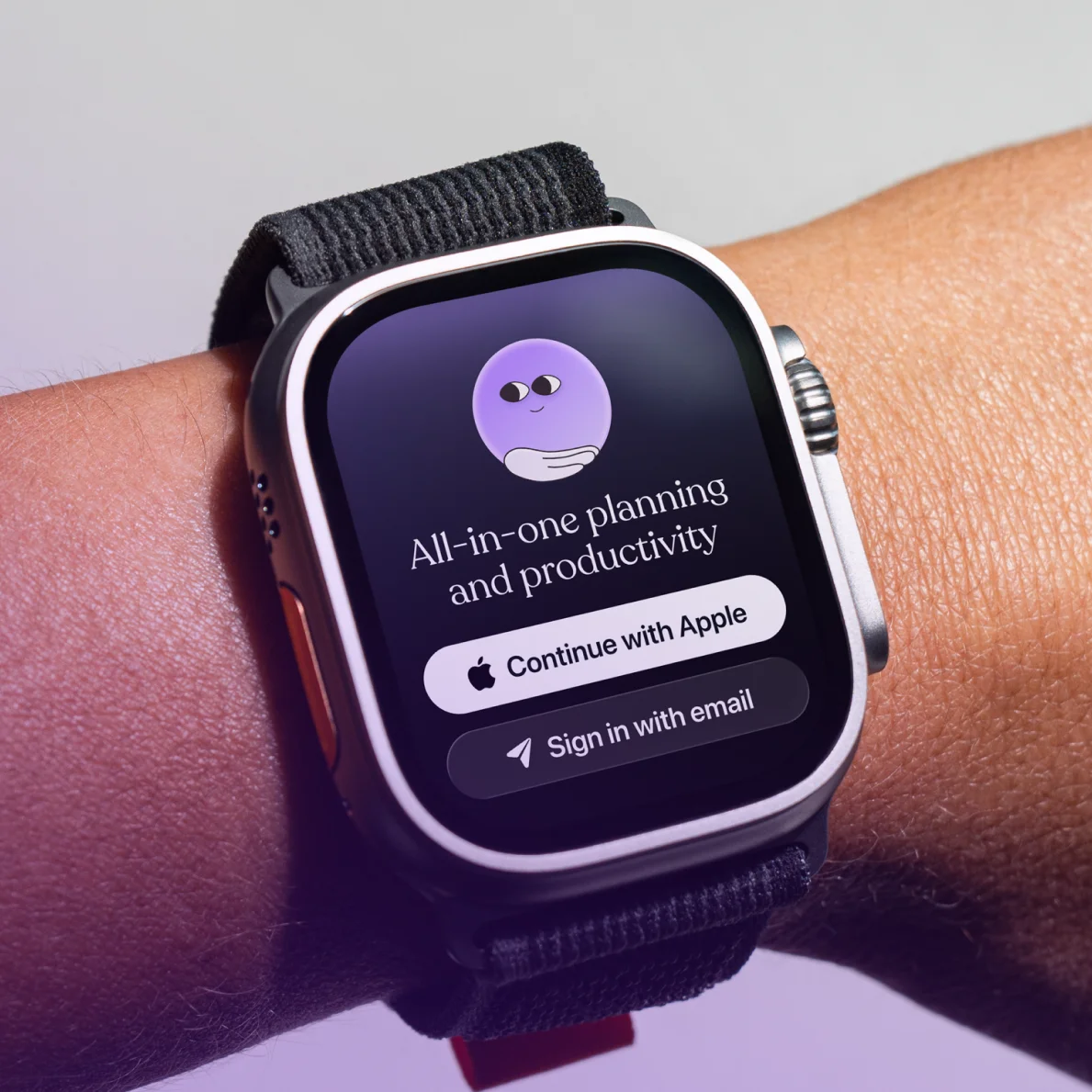 Tiimo sign-in screen on Apple Watch with options to continue with Apple or sign in with email.
