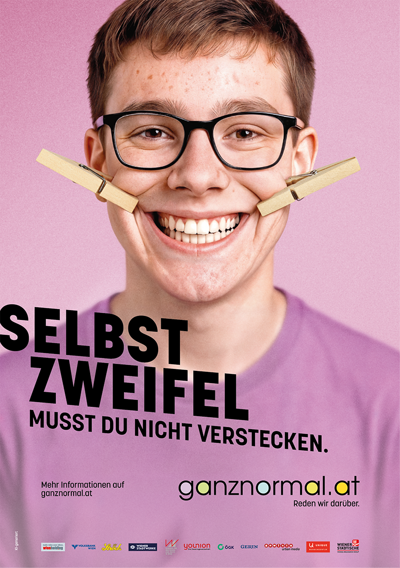 Das Selbstzweifel-Sujet zeigt einen jungen Mann mit Brille, der sich hölzerne Wäscheklammern in die Mundwinkel geklemmt hat, um ein Lächeln zu erzwingen.