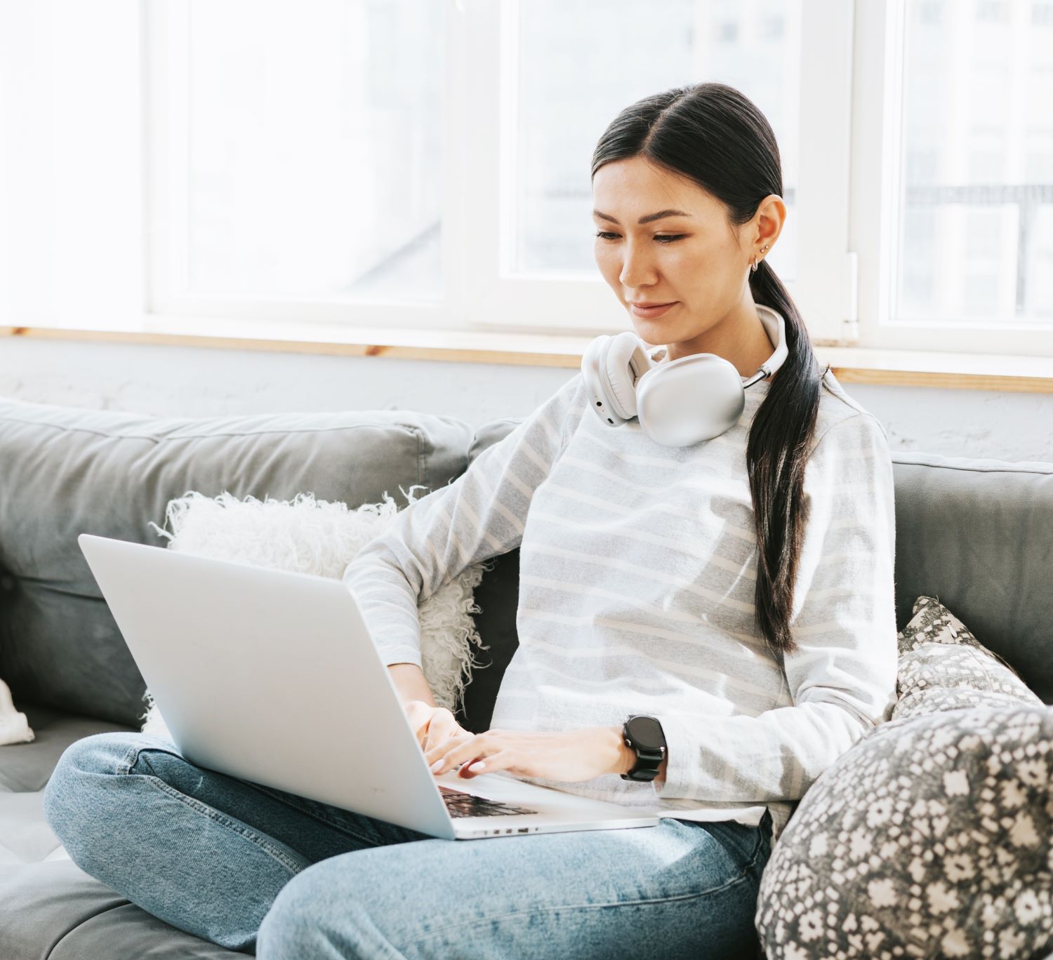 A woman working on a laptop