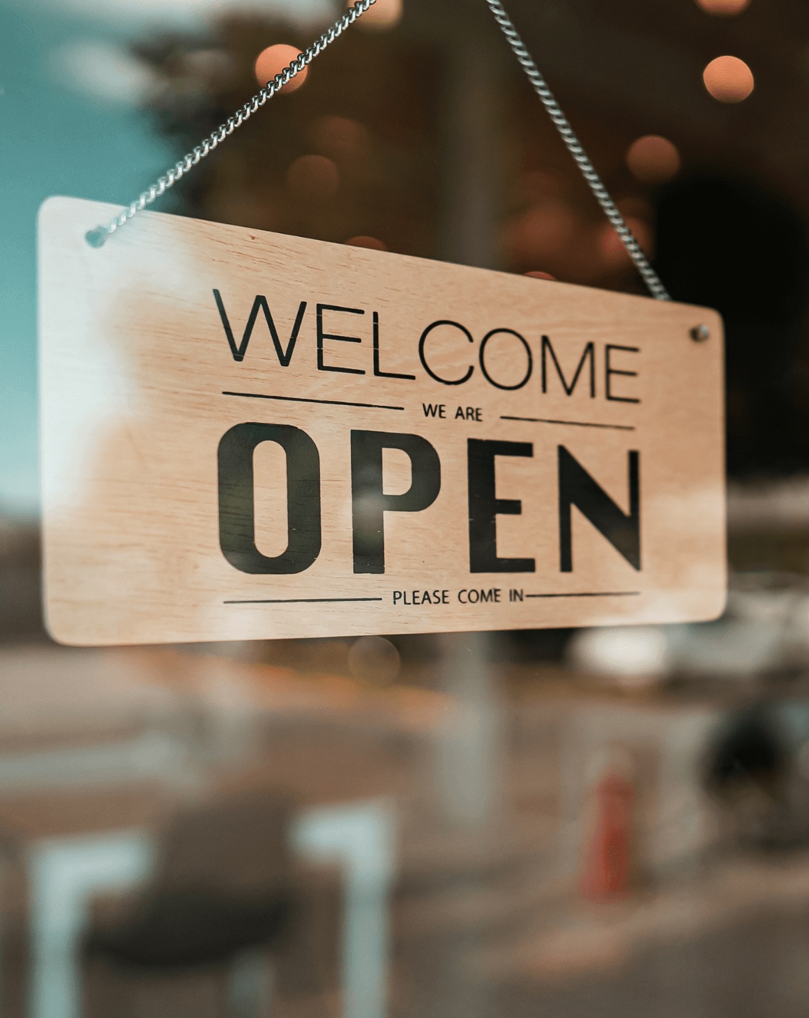 An open sign on a brand store door