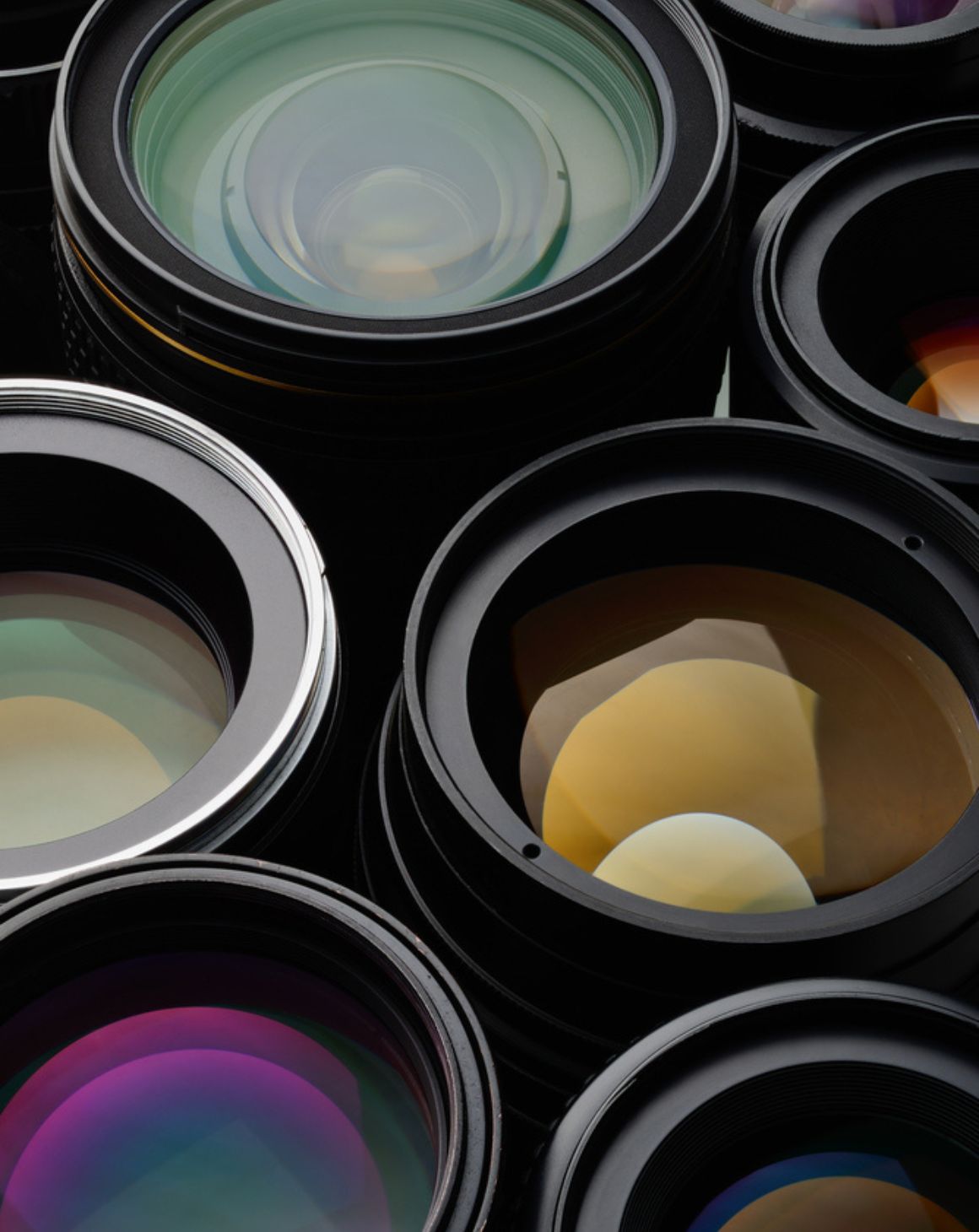 a collection of various camera lenses arranged together
