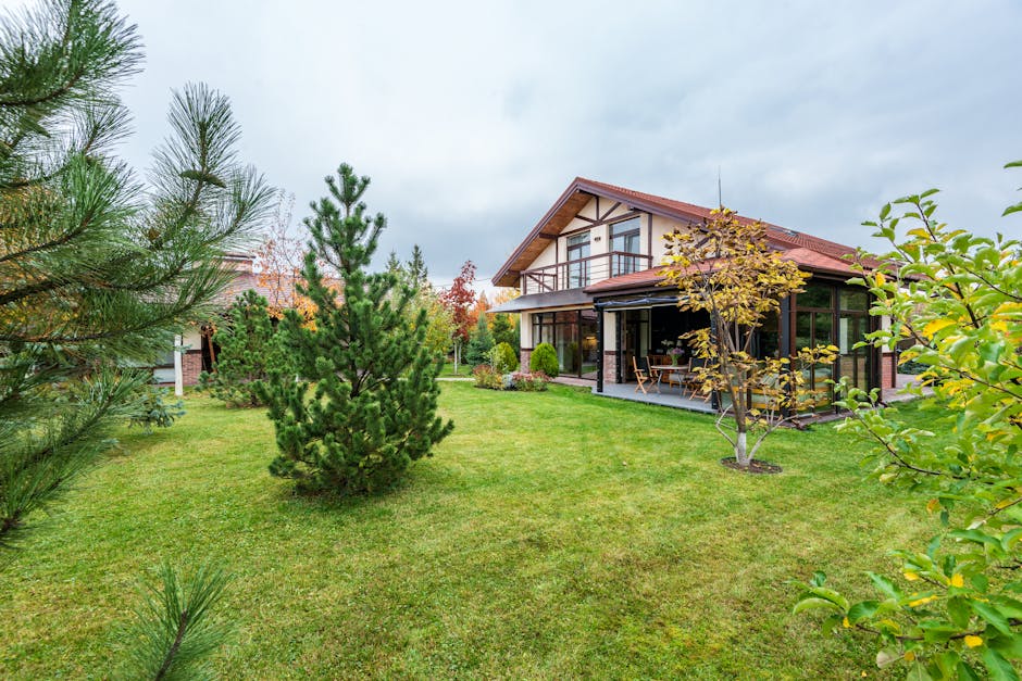 Suburban family home in Newton with well-maintained landscape - home insurance in boston