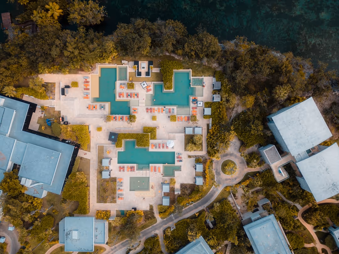 A well-maintained condo community pool and clubhouse - Condo association insurance A well-maintained condo community pool and clubhouse - Condo association insurance