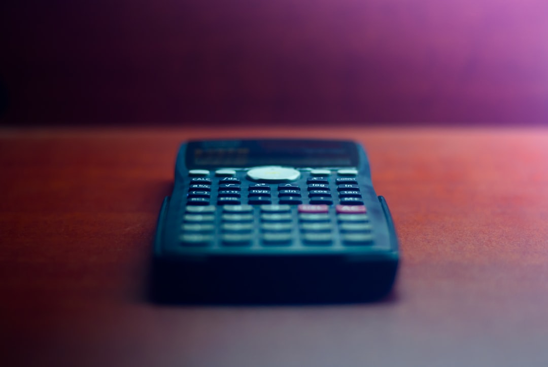 Calculator or piggy bank representing costs and savings - workers comp for independent contractors