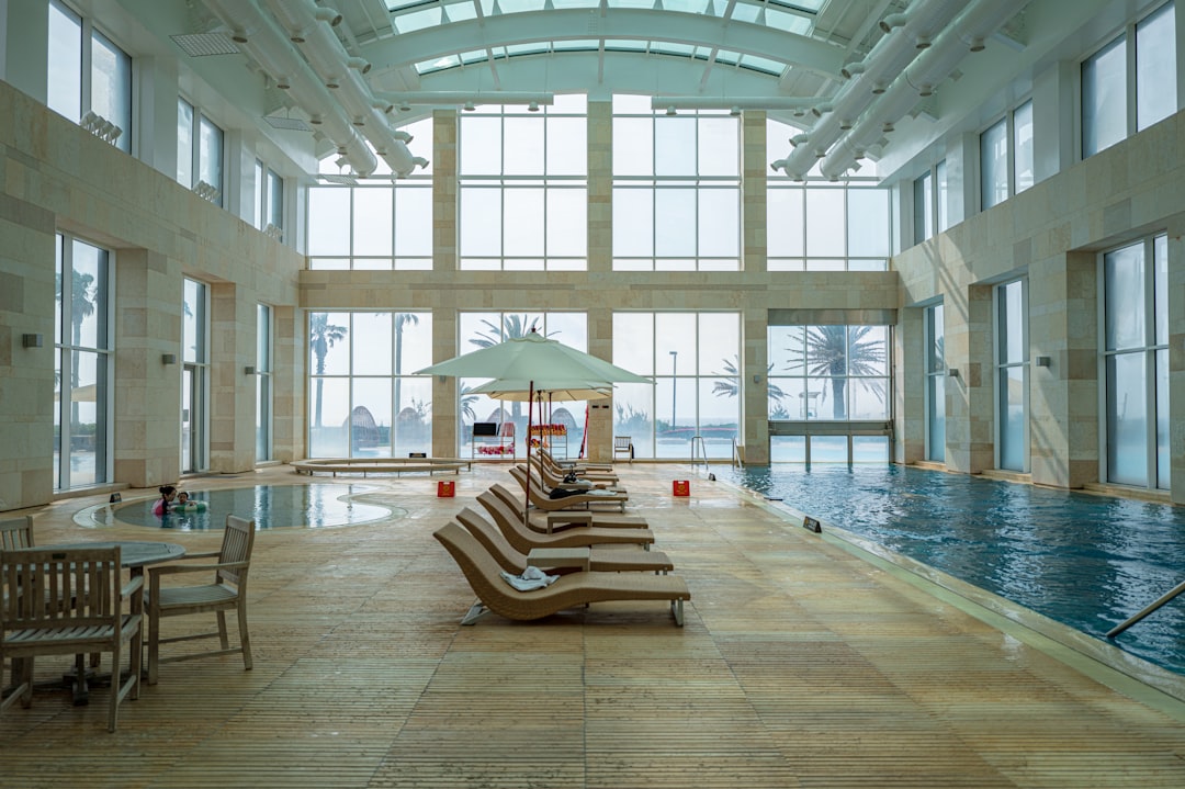 modern condo building's shared amenities like a gym or pool - master condo insurance massachusetts