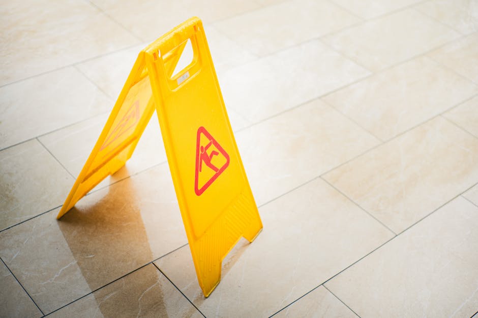 wet floor sign - do restaurants need insurance