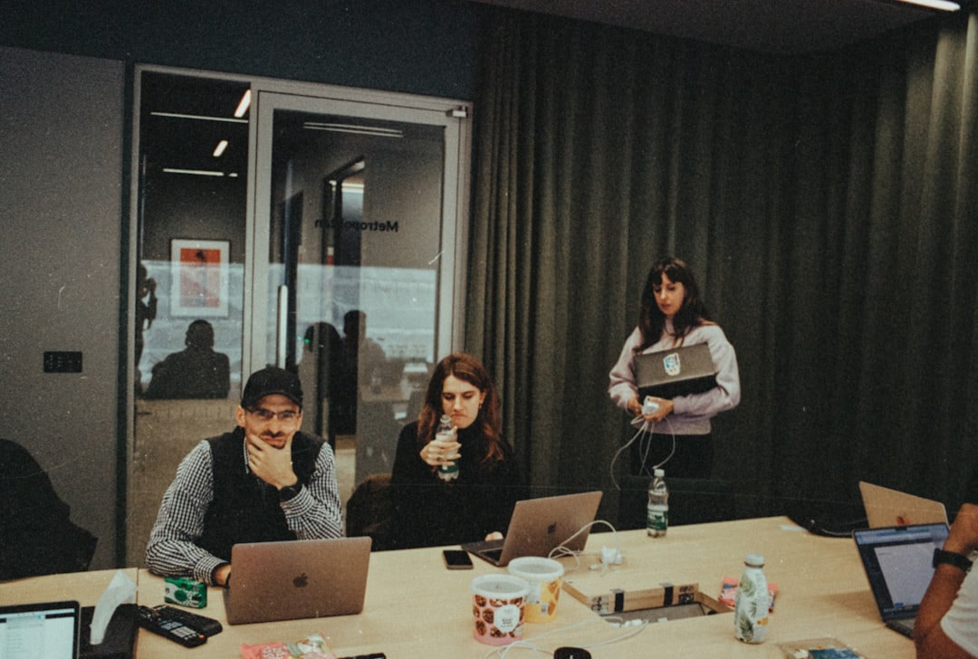 Team collaborating on marketing content, reviewing for compliance - advertising injury coverage Team collaborating on marketing content, reviewing for compliance - advertising injury coverage