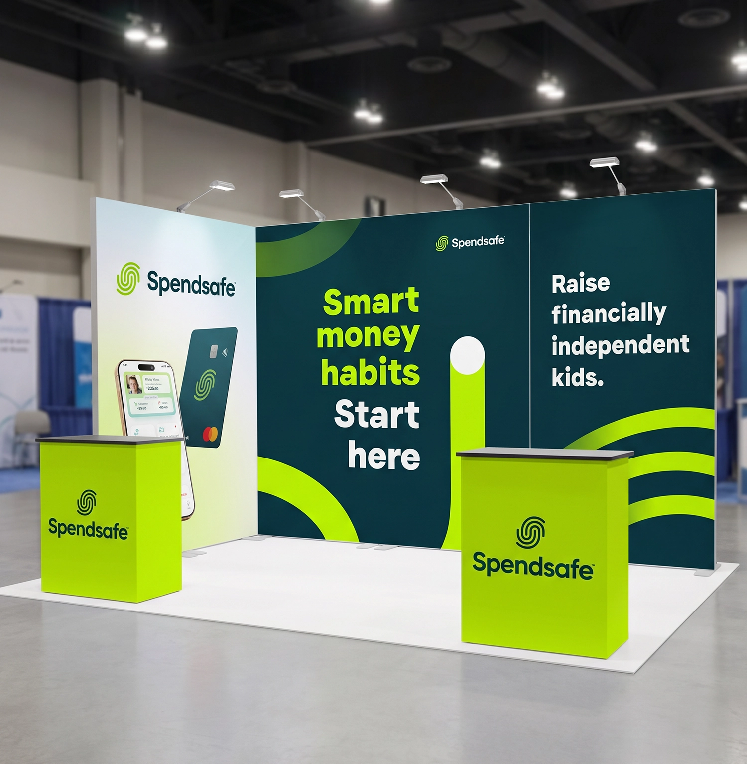 A booth at a tradeshow that's branded for Spendsafe. colours are dark navy blue, bright neon green, and minimal light blue/green gradient. Signs in the back of the booth show the Spendsafe logo, pictures of the app and the debit card, and taglines saying "Smart money habits start here", and "Raise financially independent kids"