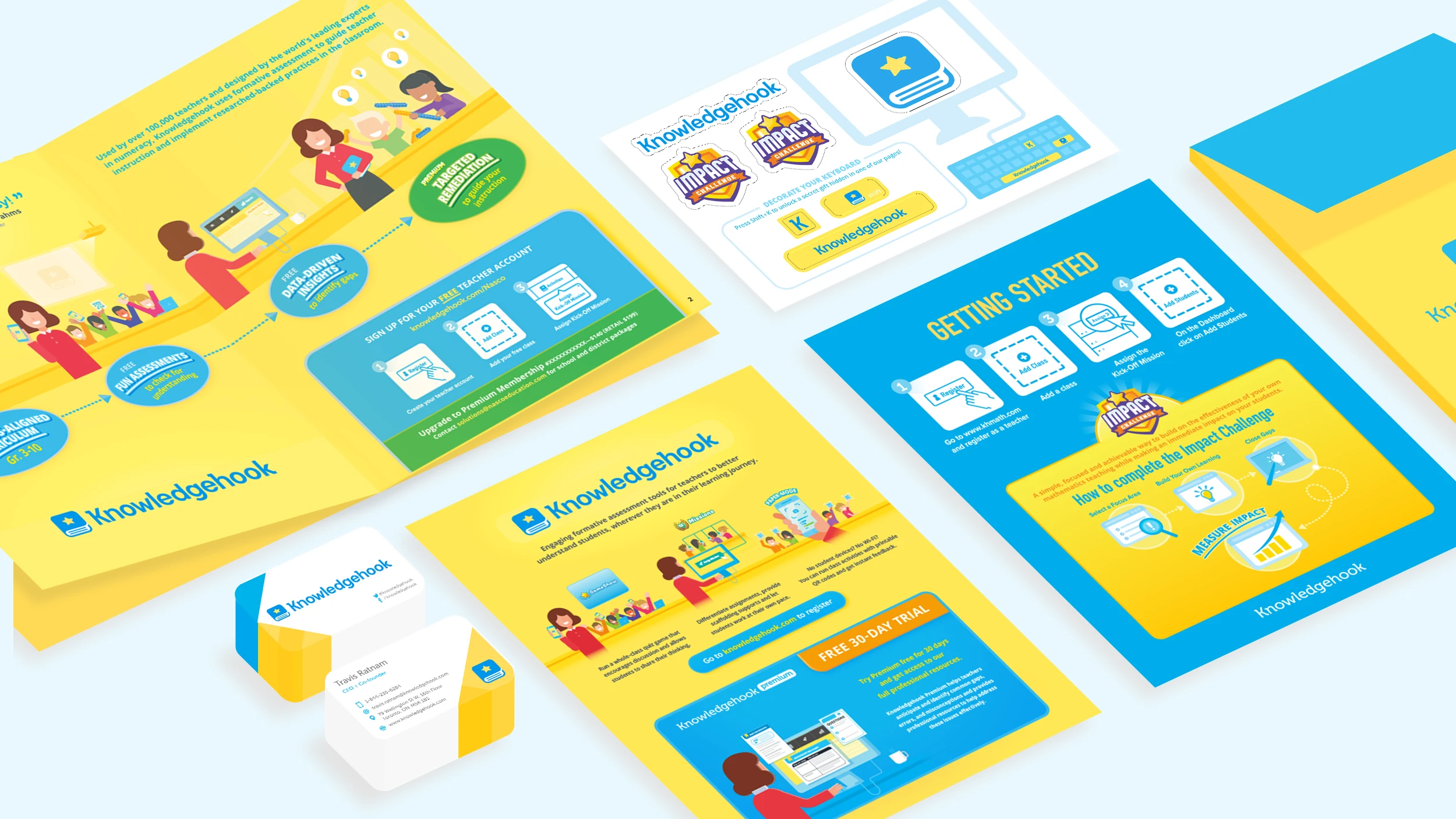 An over view of pamphlets, brochures, business cards, and folders all branded to Knowledgehook are laid out on a white surface