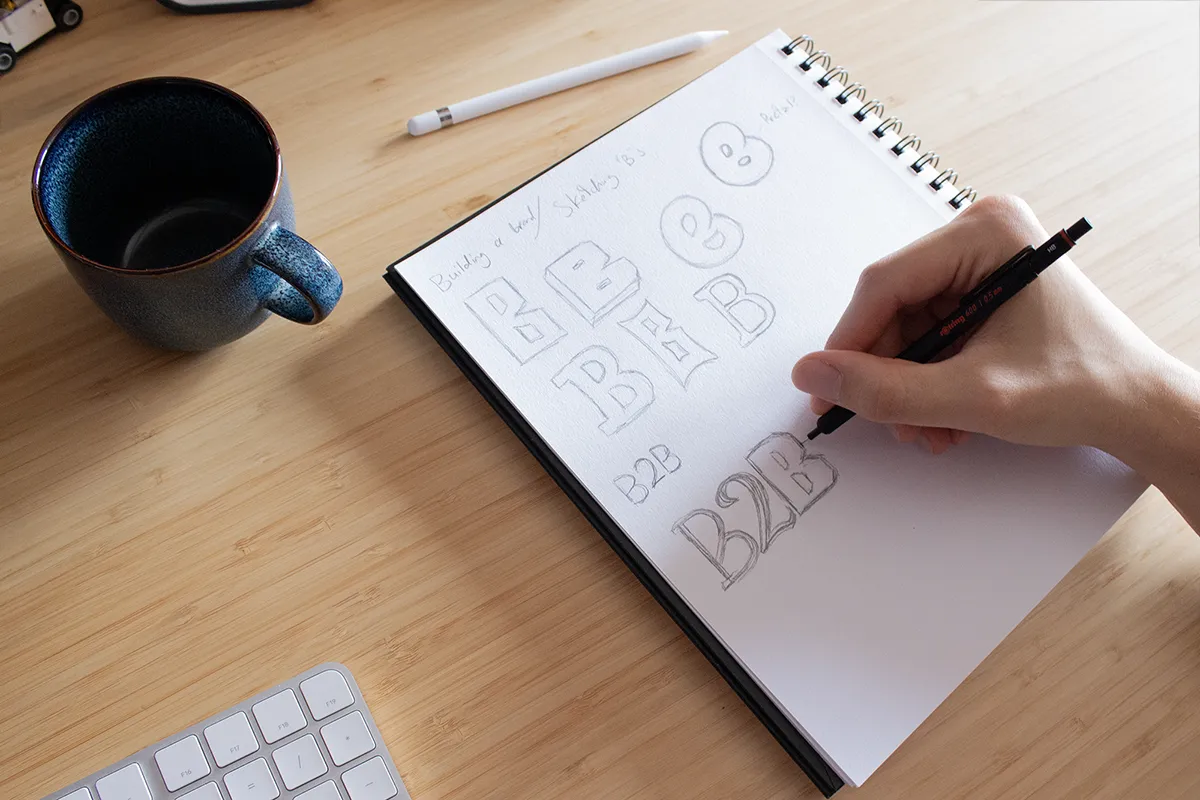 Picture of Jeremy sketching in his sketchbook