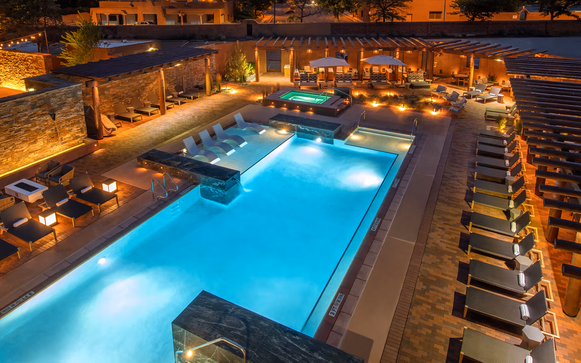 Aerial view of pool at dusk