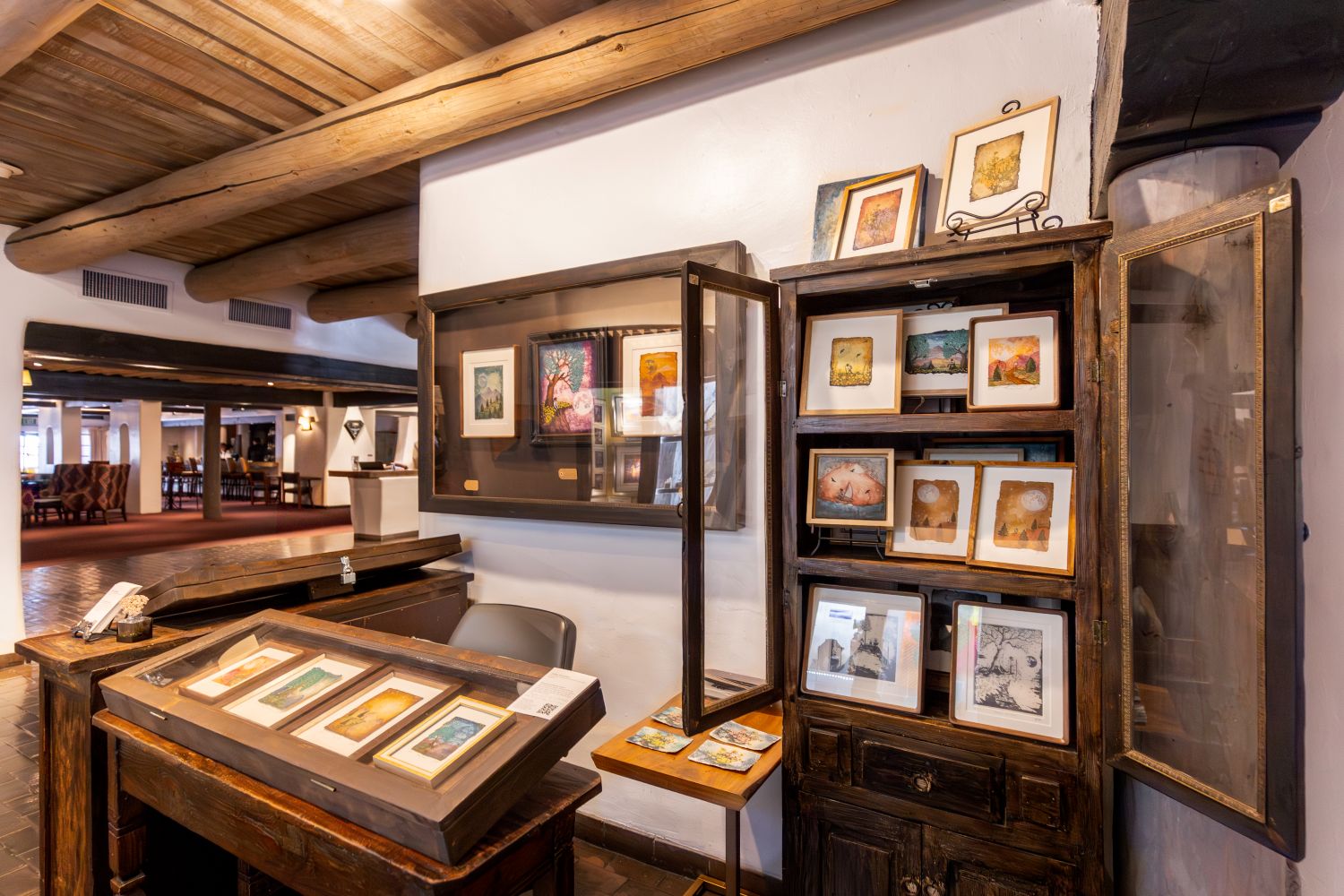 Cabinets displaying Bindlestick Books art