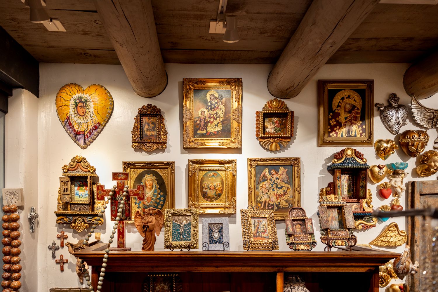 Religious art work hanging on display in Seraphym's shop at Loretto