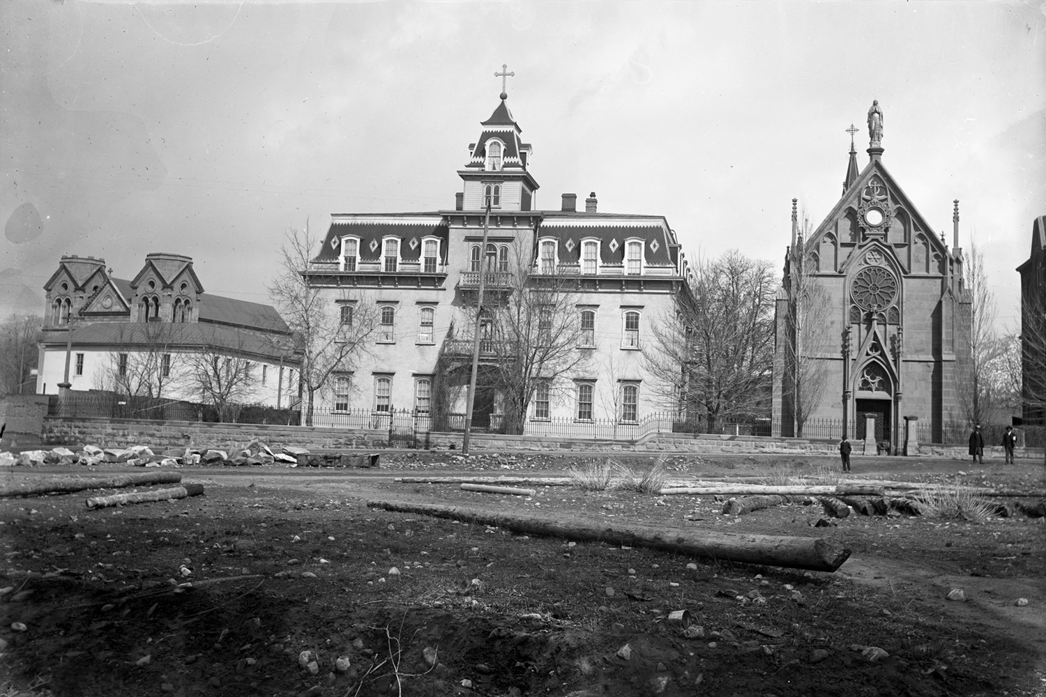 Photographer: Reverend John C. Gullette, Title: Loretto Academy school in center, Loretto Chapel on right with Archbishops residence and Saint Francis Cathedral in background, Santa Fe, New Mexico, Date: ca. 1905, Courtesy Palace of the Governors Photo Archives (NMHM/DCA), Negative Number: 001411