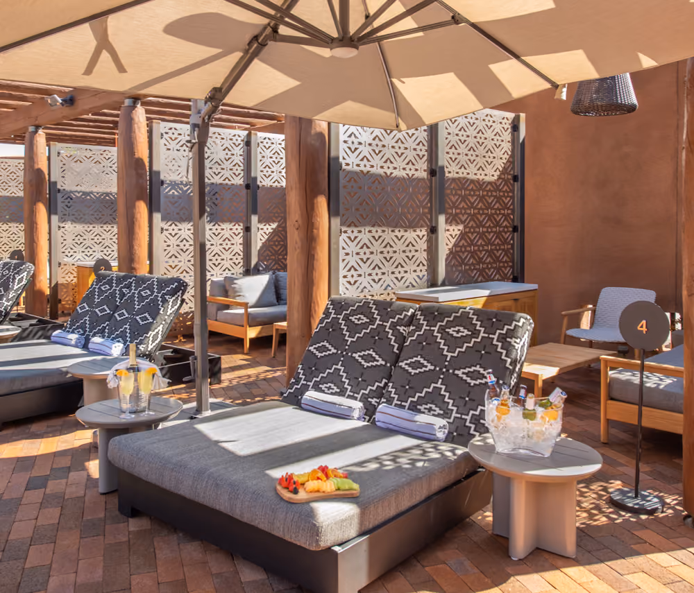 Cabanas with towels and umbrella