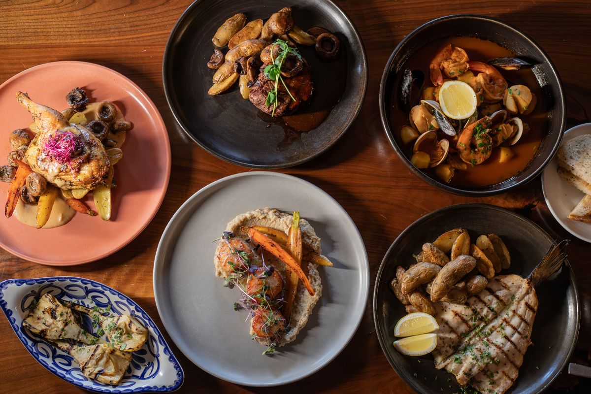 Various dishes of seafood on table
