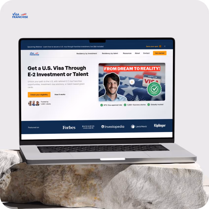 Visa Franchise website displayed on a laptop, highlighting a Webflow-powered platform that helps entrepreneurs obtain U.S. visas through investment or talent-based immigration programs.