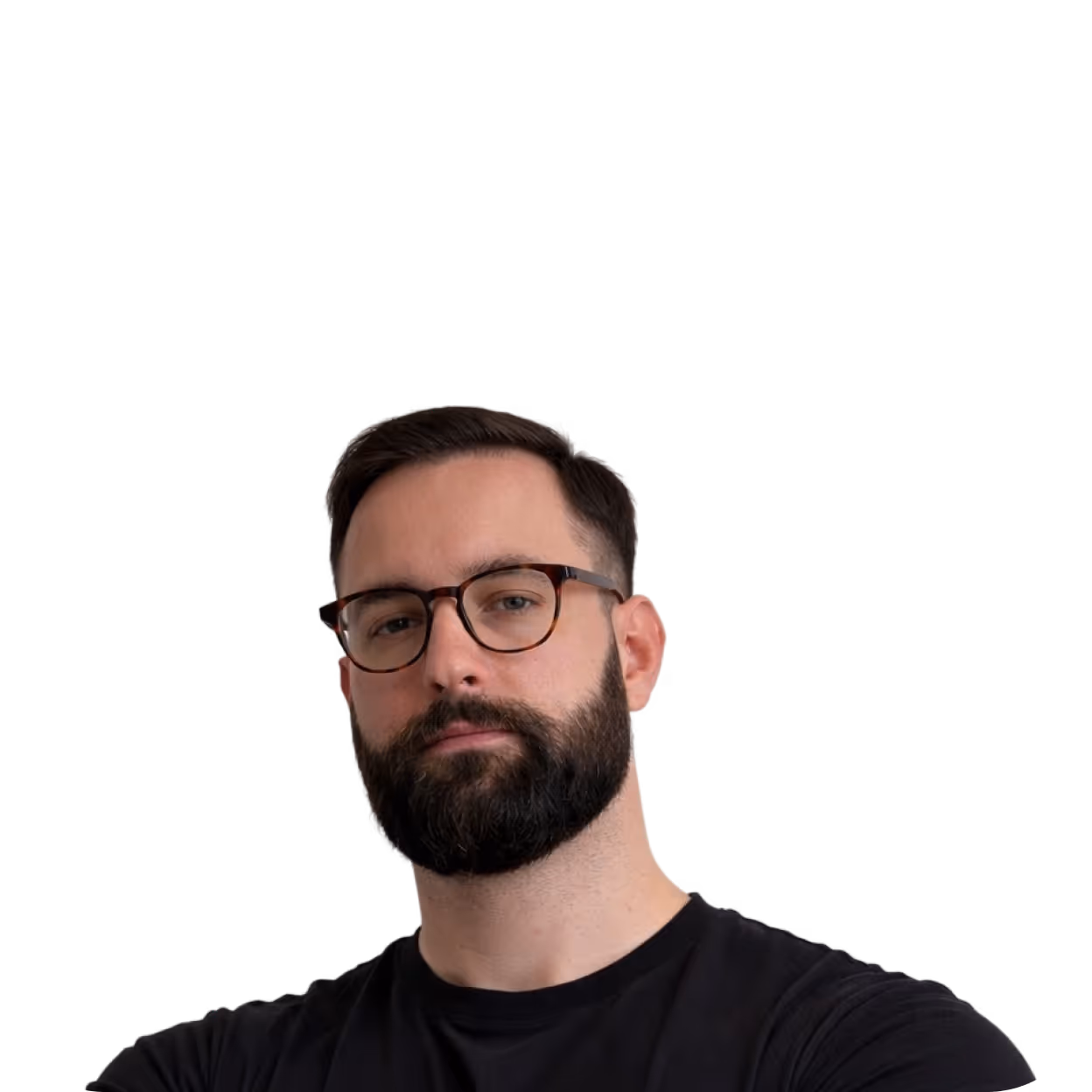 Bearded man with glasses wearing a black shirt, looking confidently at the camera.