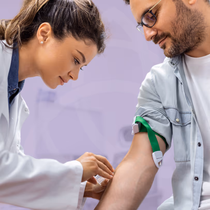 Nurse drawing blood from a patient’s arm for a private blood test
