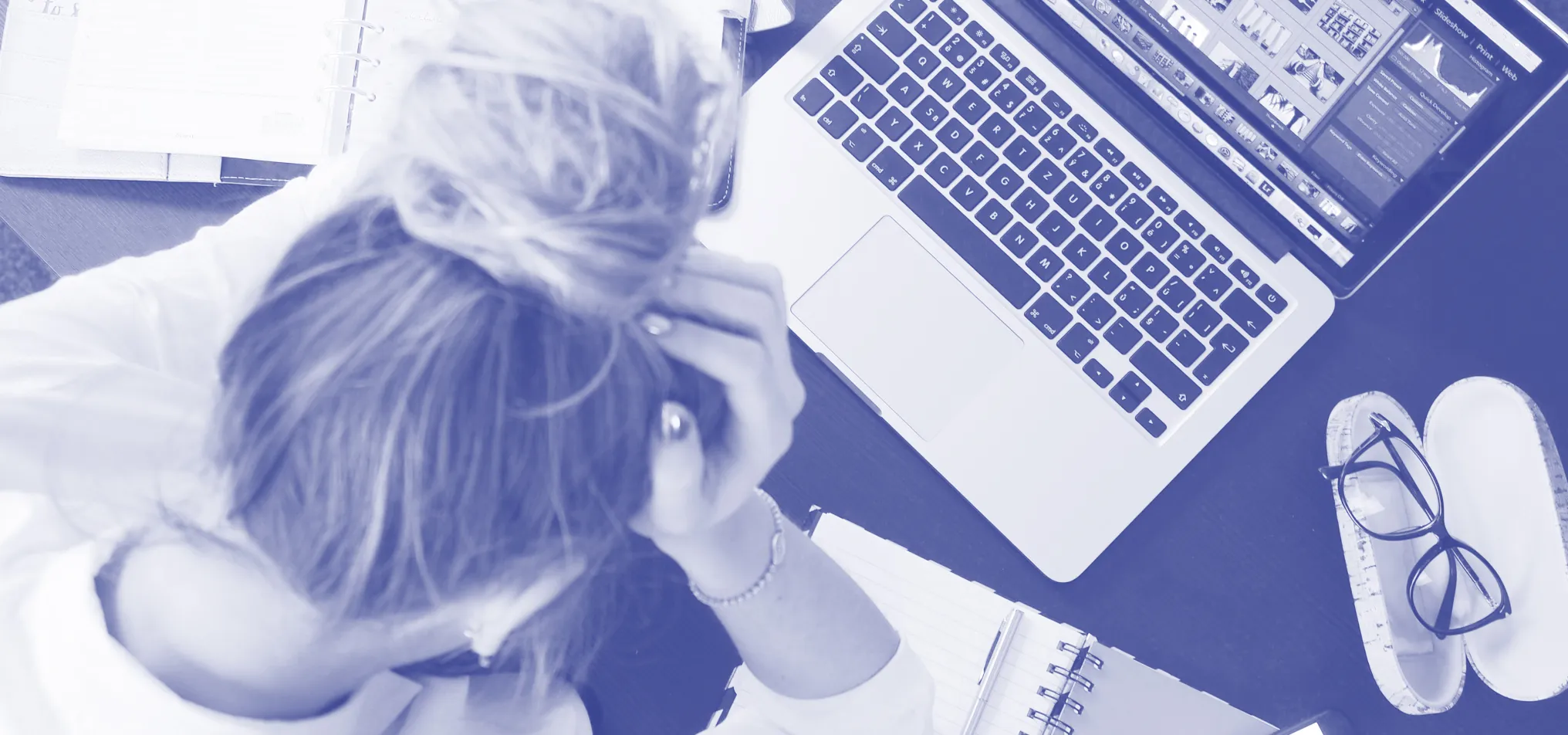 a woman working on laptop