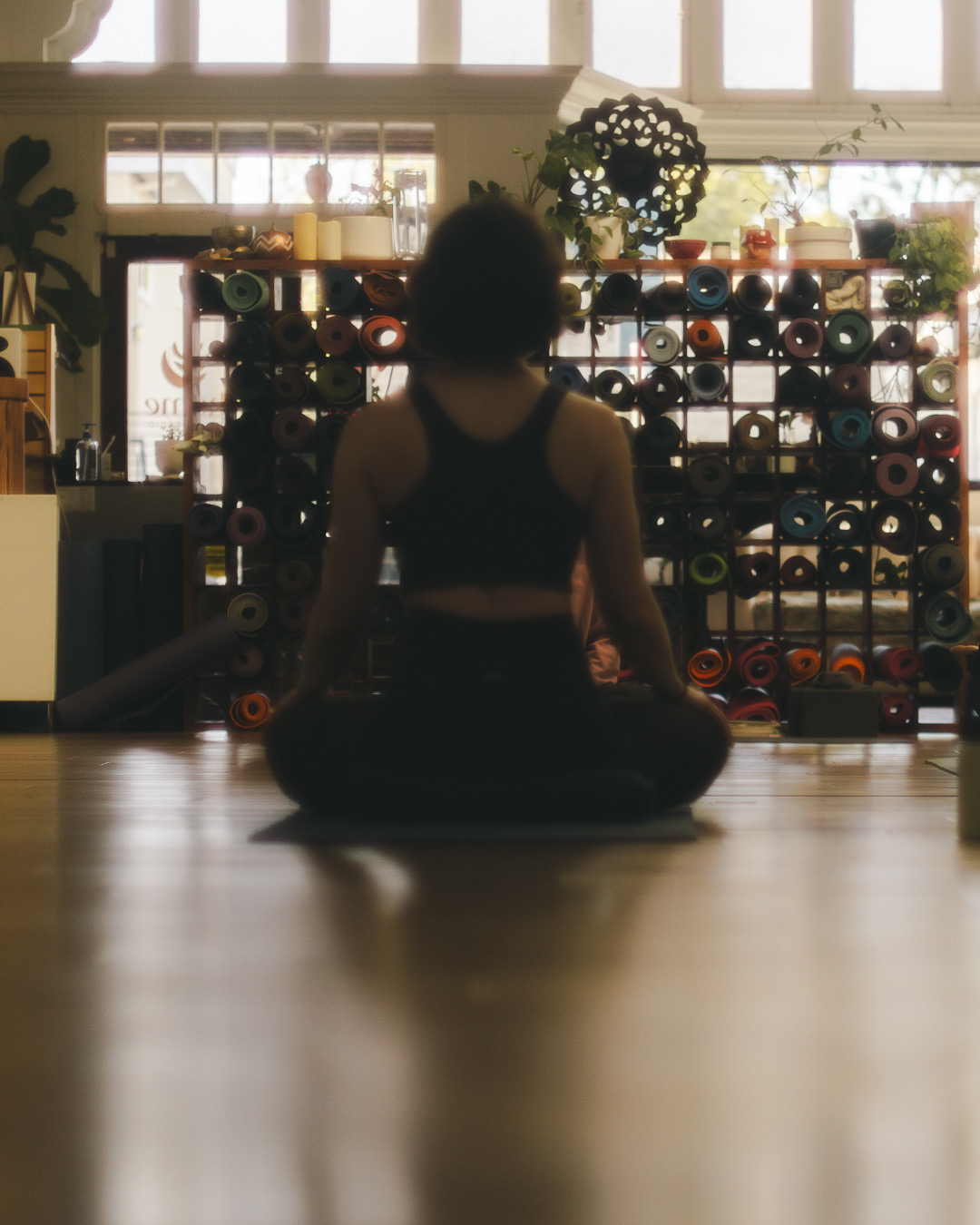 Student walking into Home Studio Yoga in San Anselmo for their first beginner yoga class"