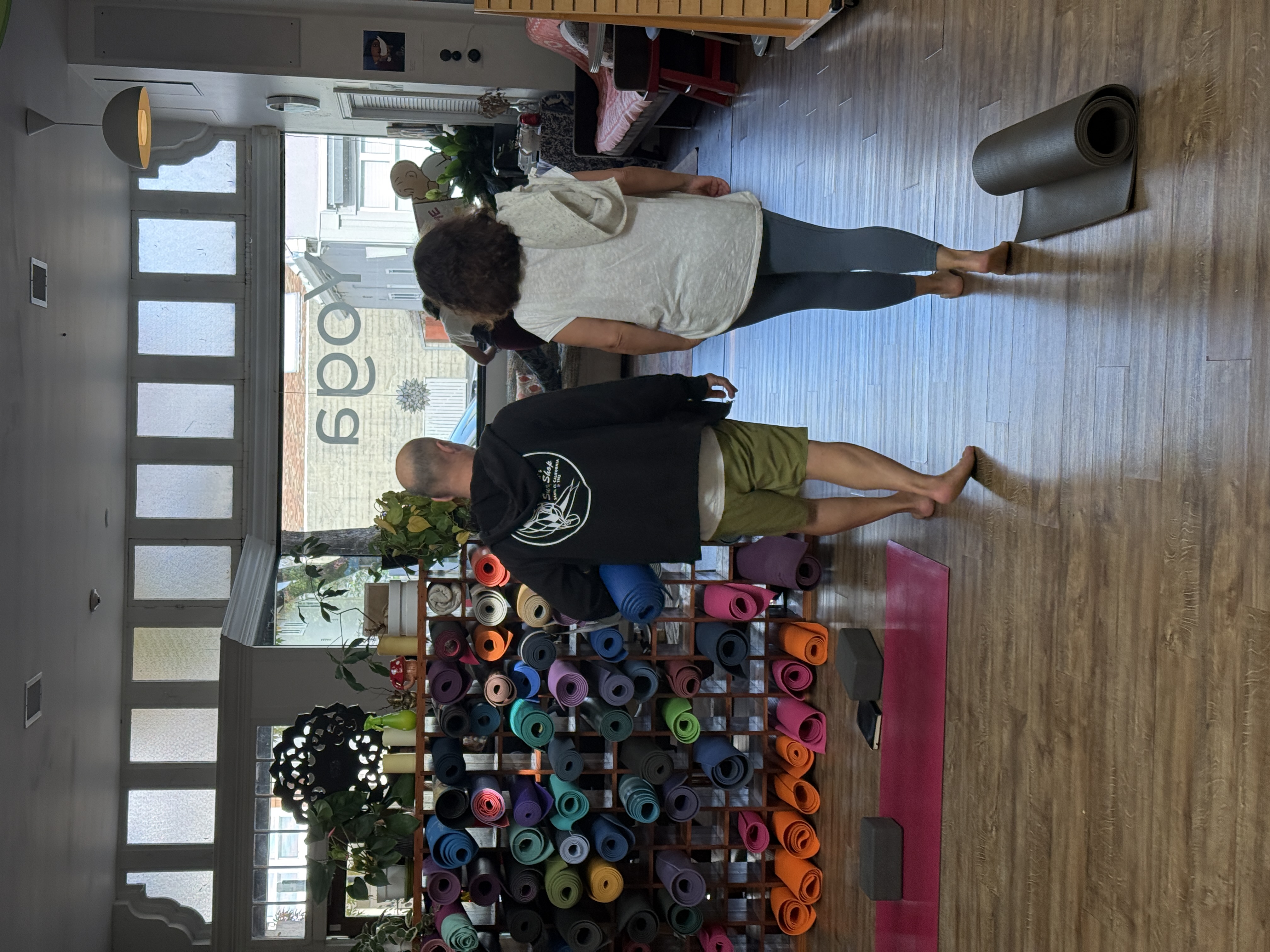 Student arriving at Home Studio Yoga in San Anselmo for a community yoga class